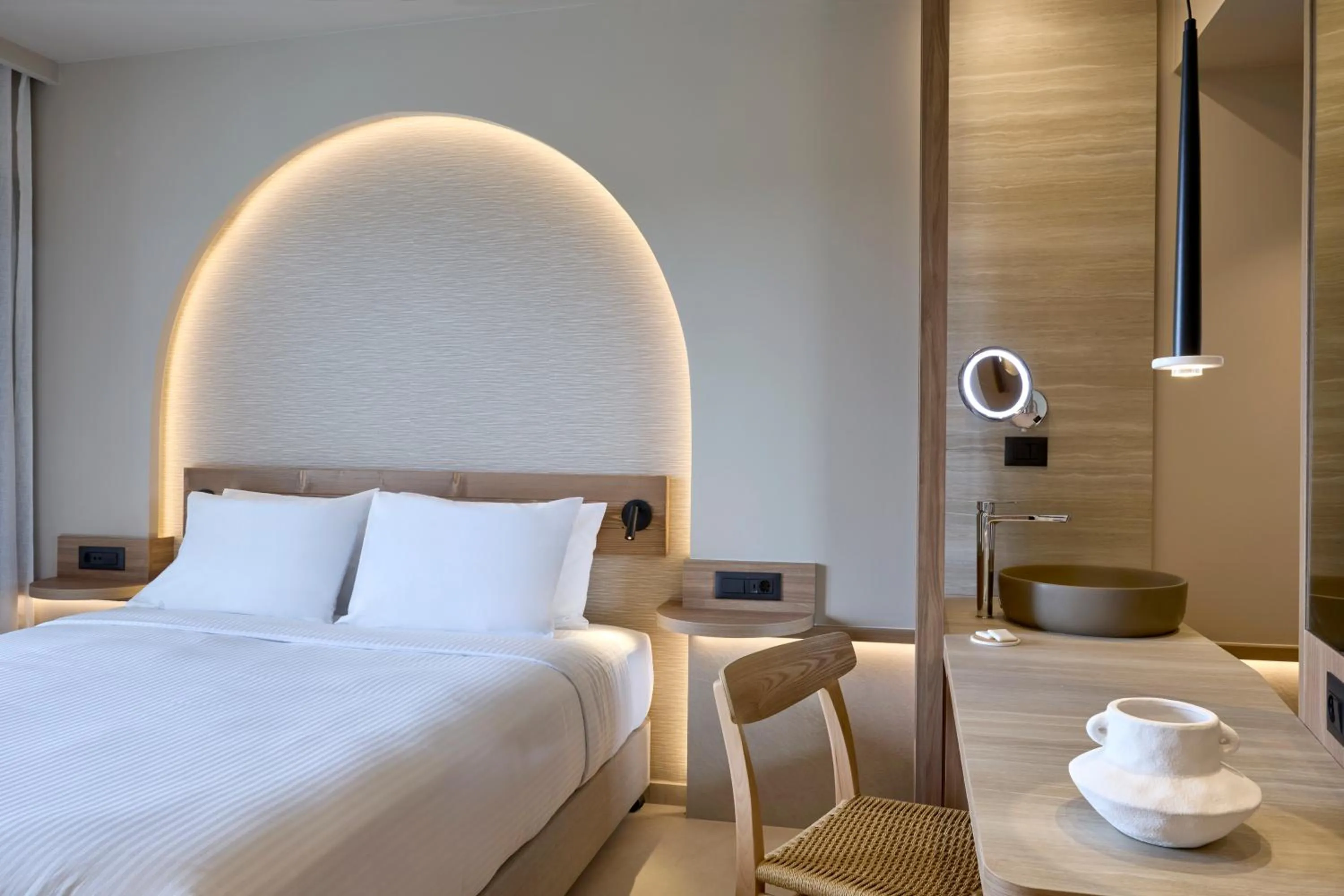 Bed in Ammos Luxury Resort