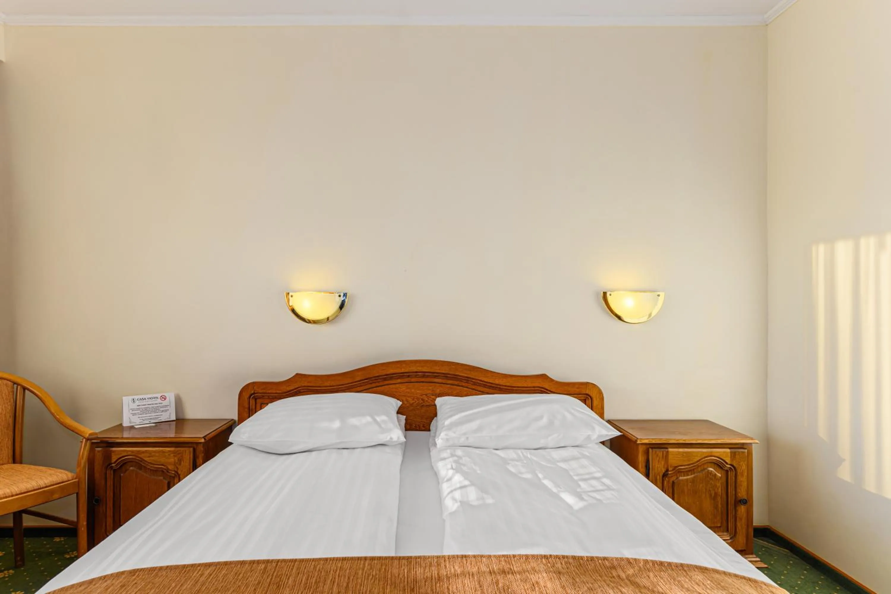 Bed in Hotel Casa Viorel jacuzzi & saunas