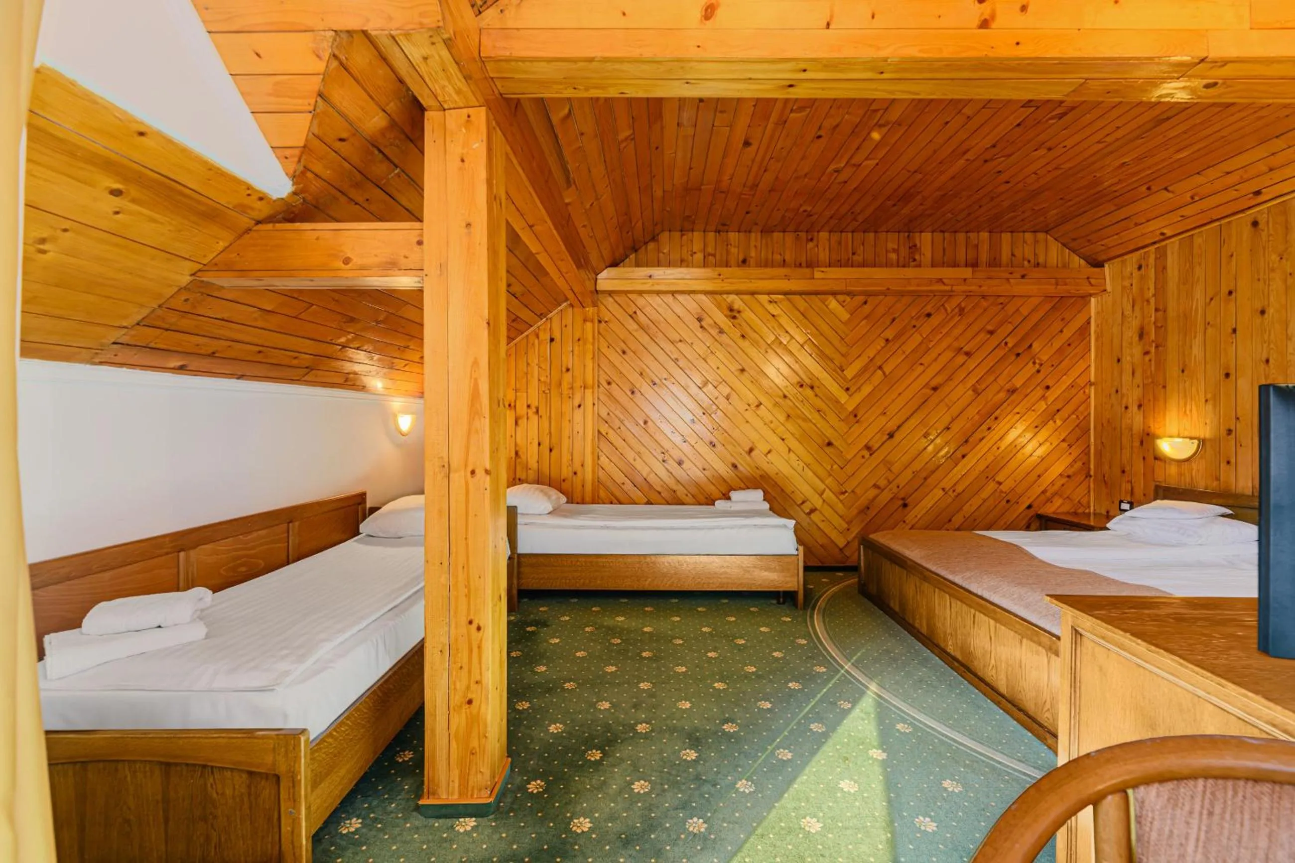 Bed in Hotel Casa Viorel jacuzzi & saunas