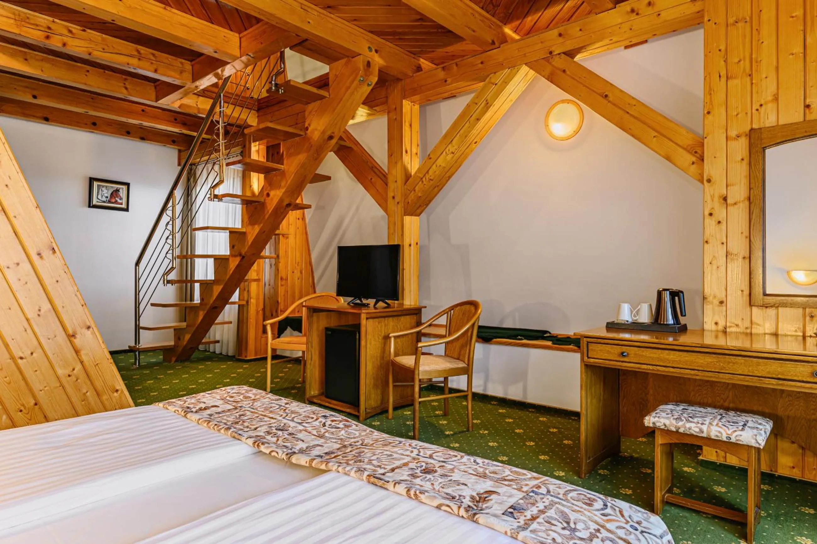 Bed in Hotel Casa Viorel jacuzzi & saunas