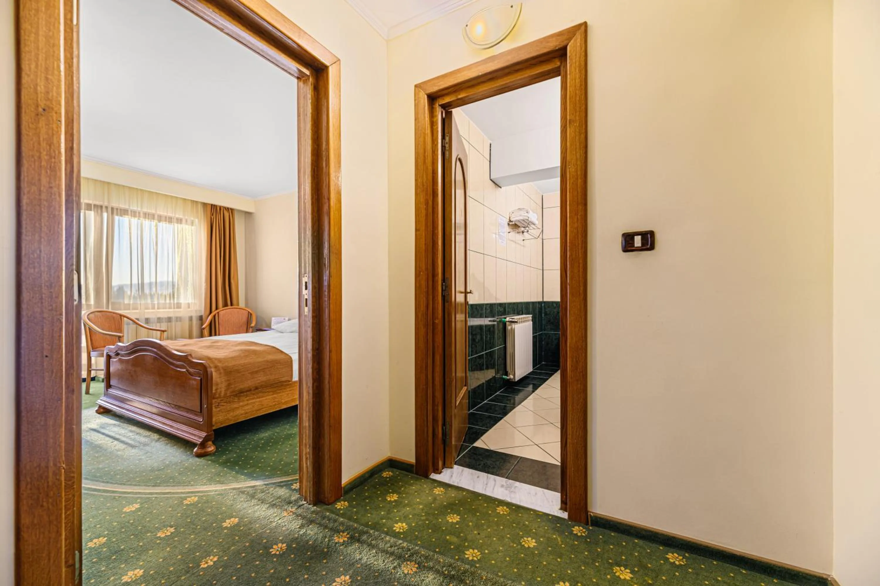 Bed in Hotel Casa Viorel jacuzzi & saunas