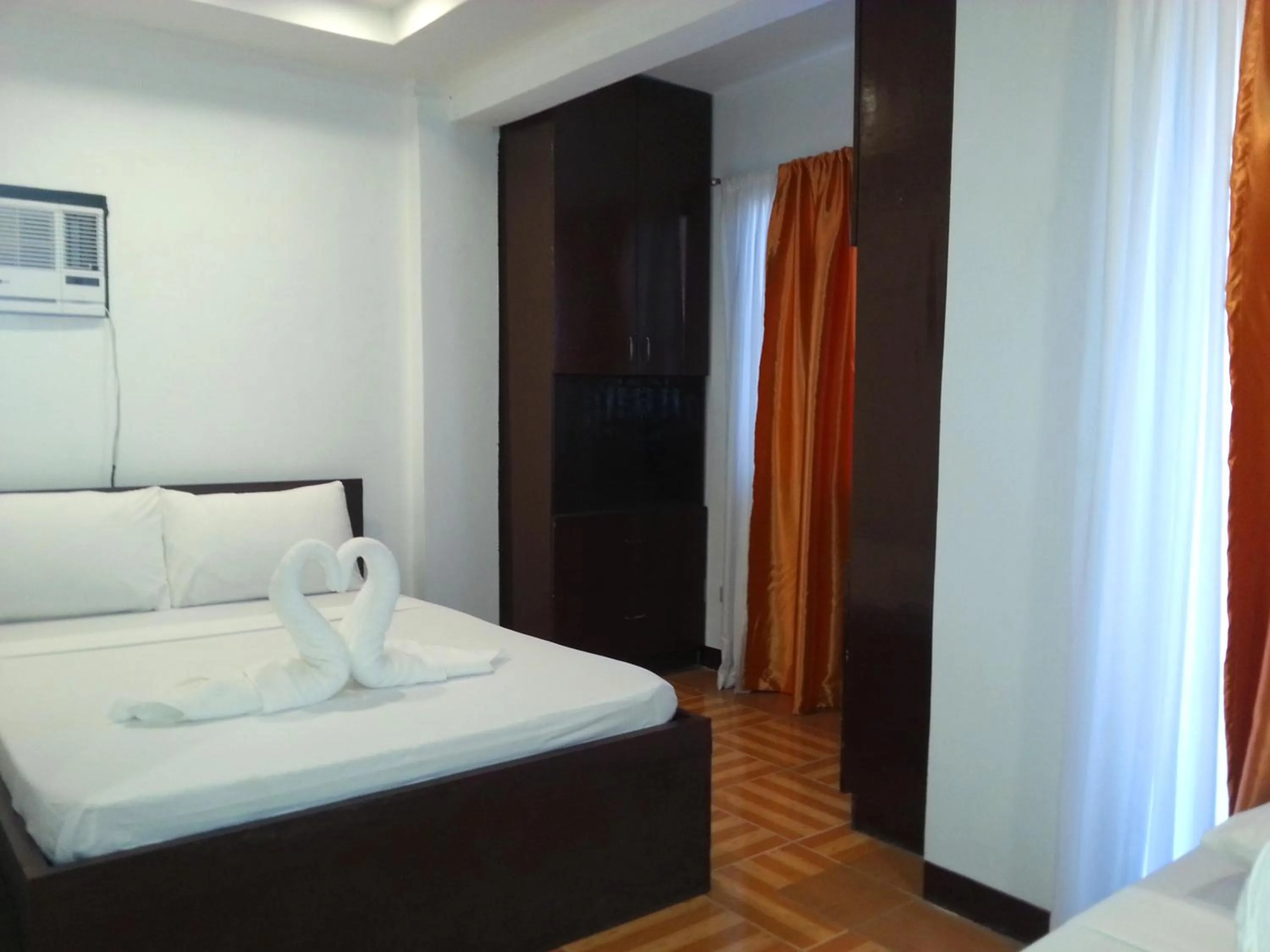 Bed in Ricardo Valley Inn