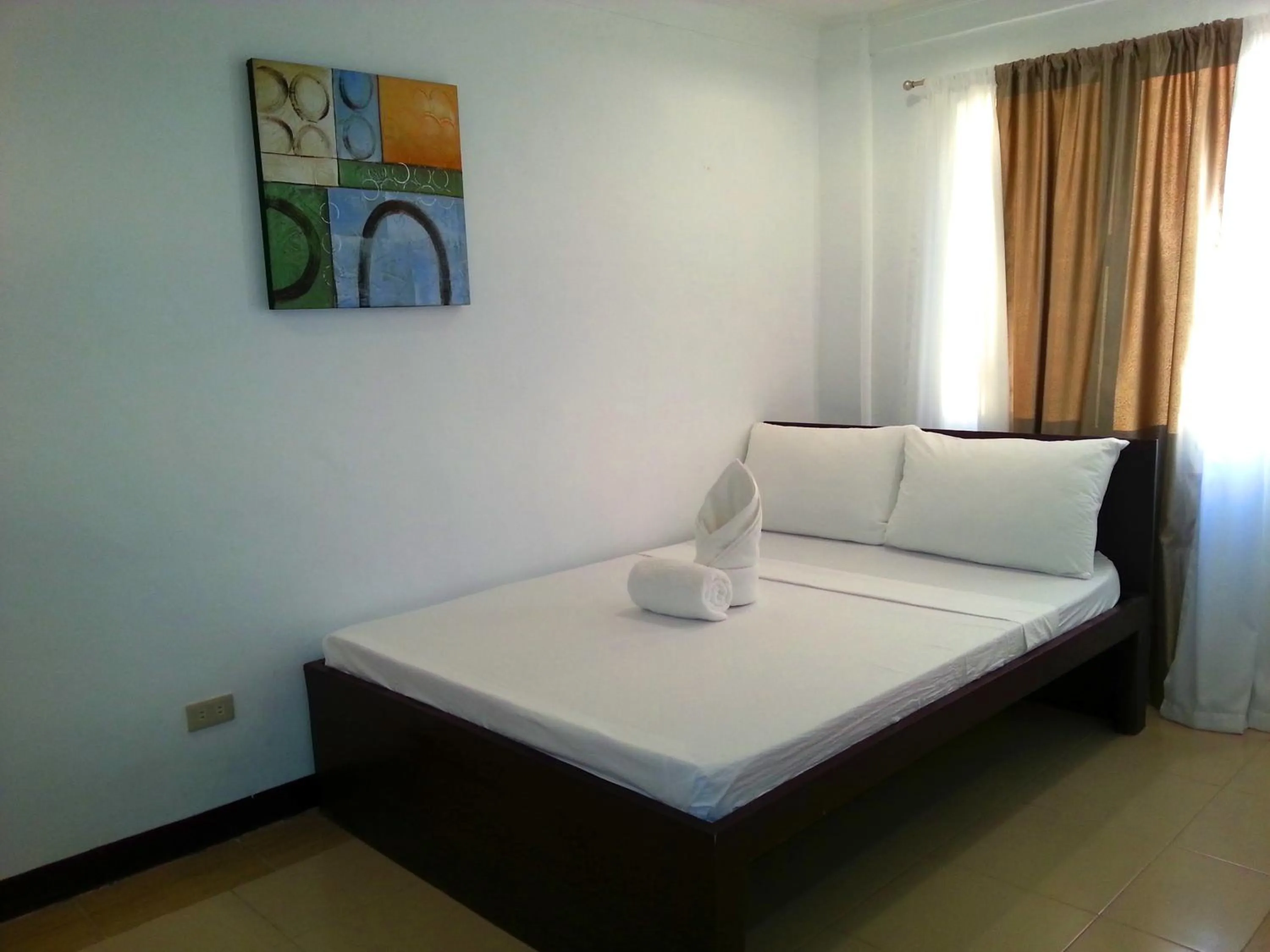 Bed in Ricardo Valley Inn