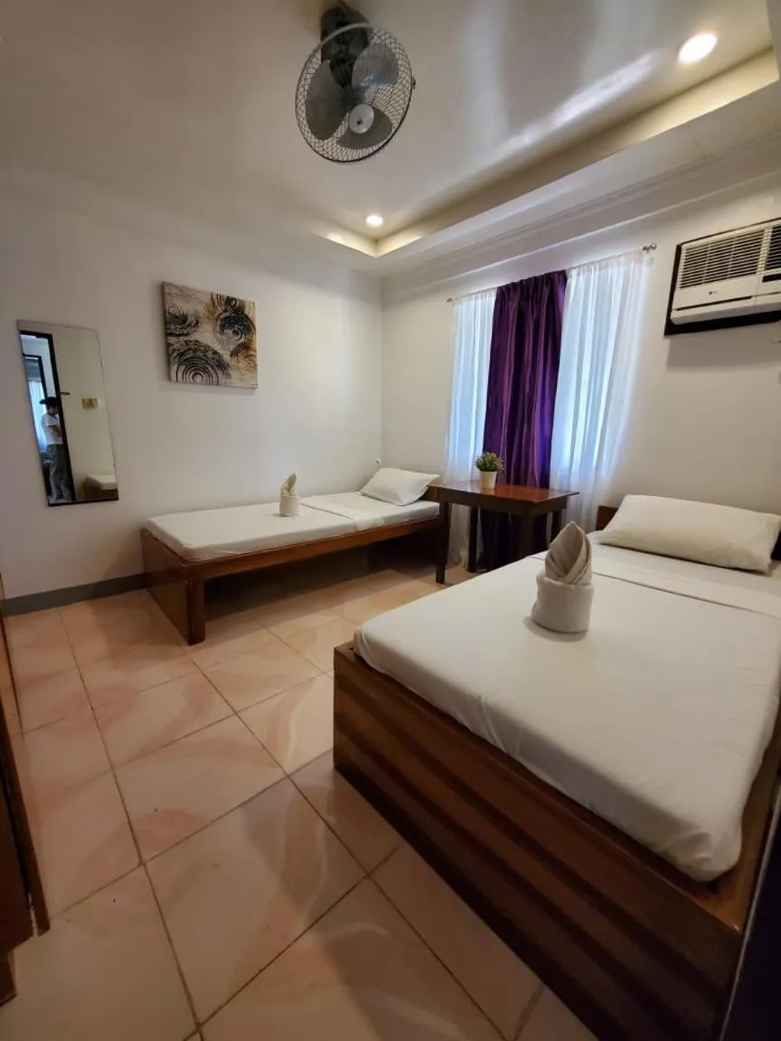 Bed in Ricardo Valley Inn