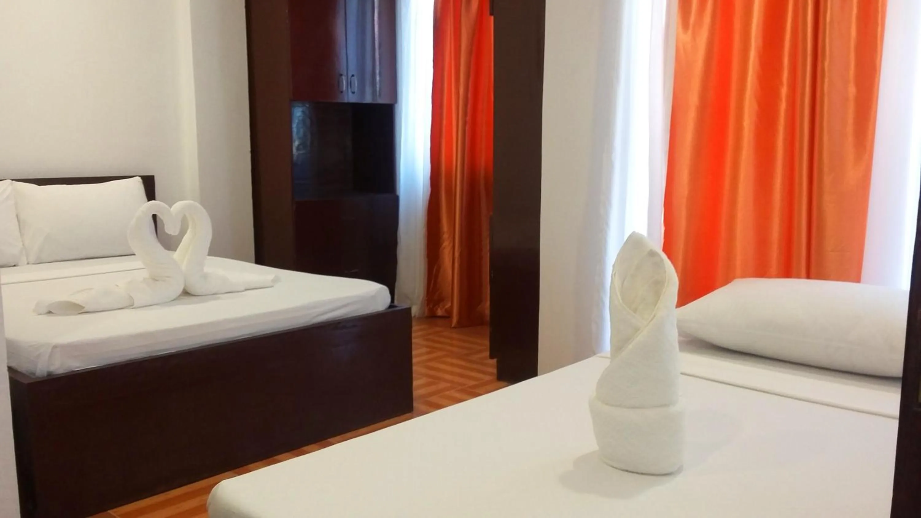 Bed in Ricardo Valley Inn