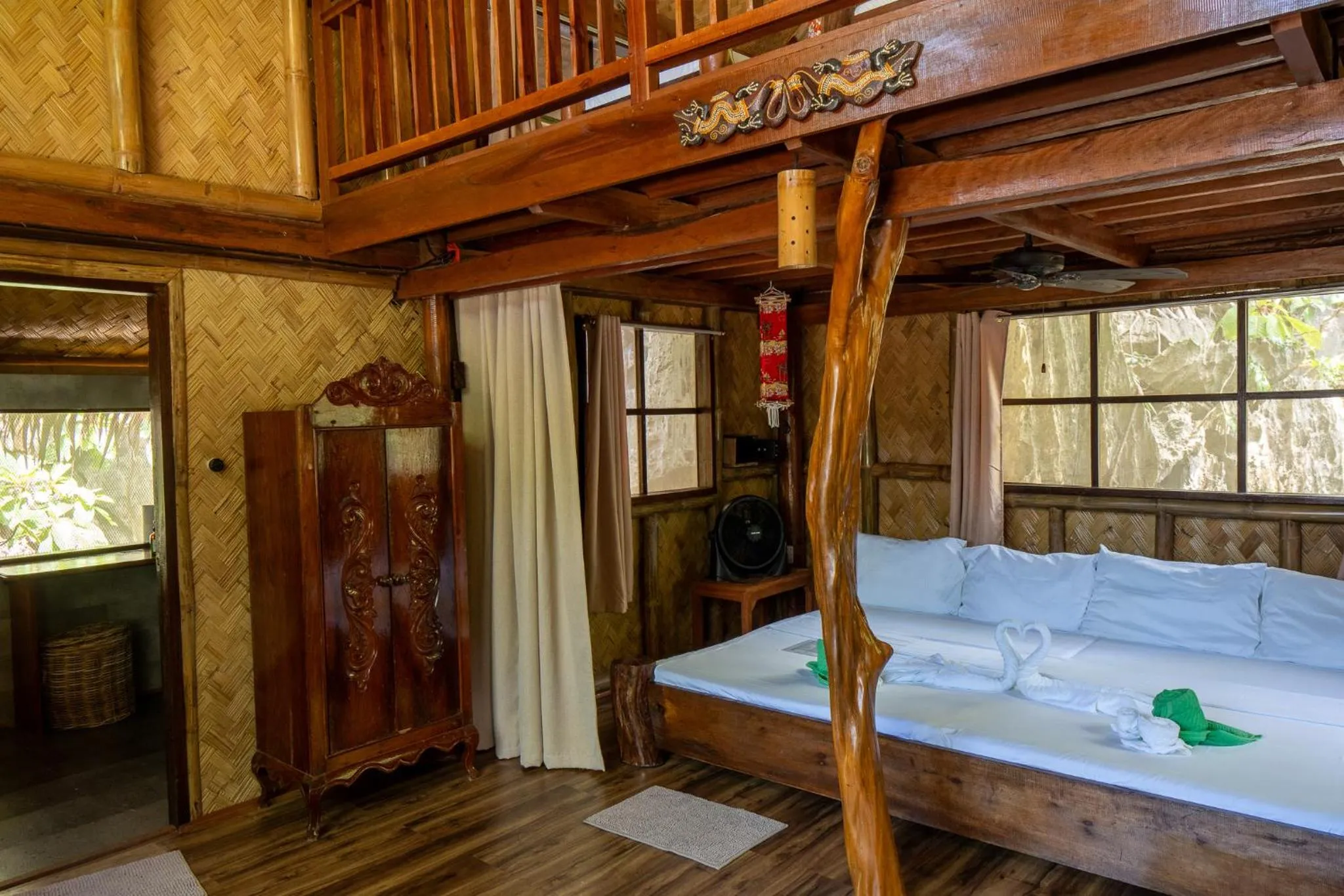 Bed in Sangat Island Dive Resort