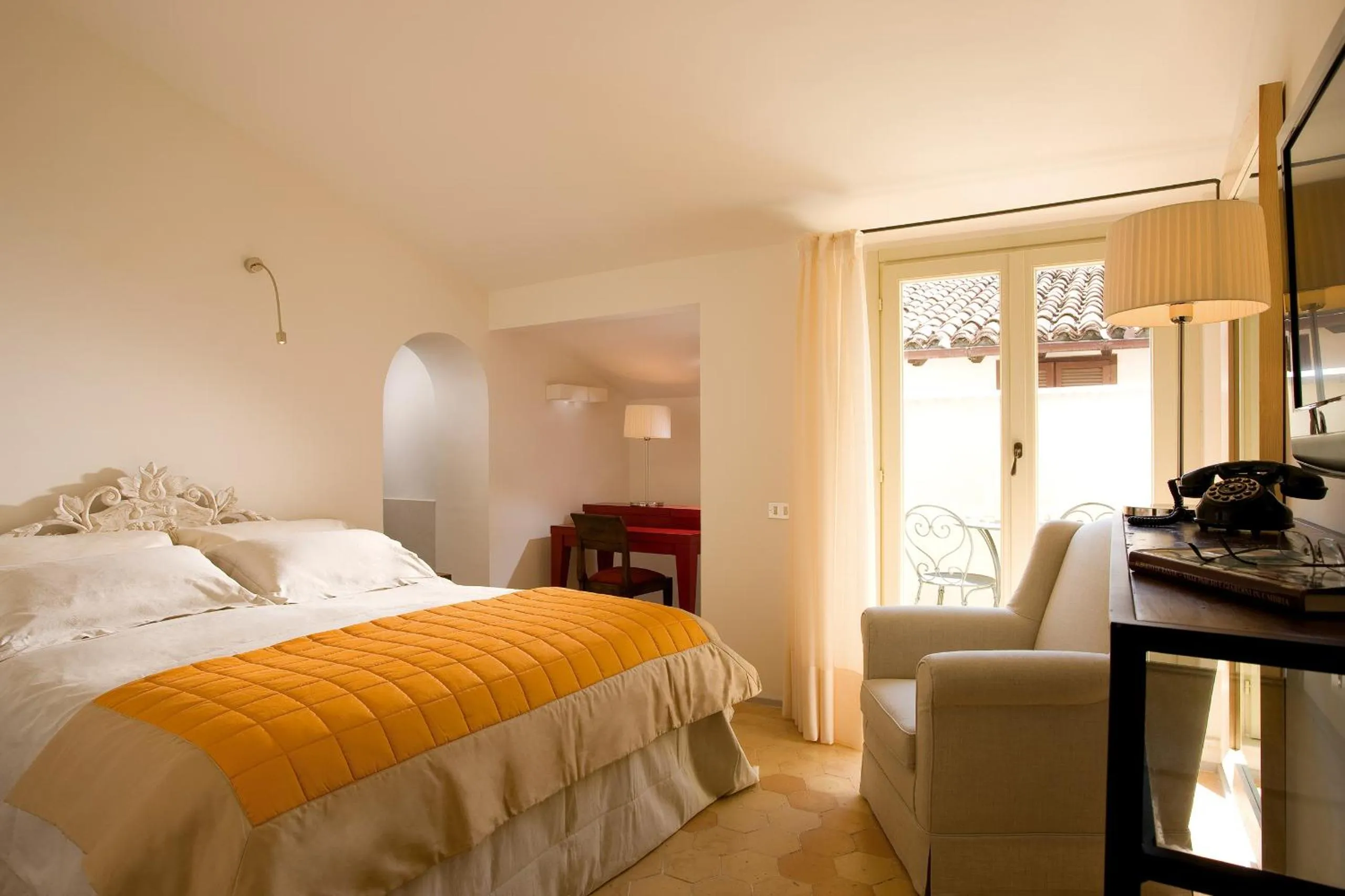 Photo of the whole room, Bed in Relais & Chateaux Palazzo Seneca