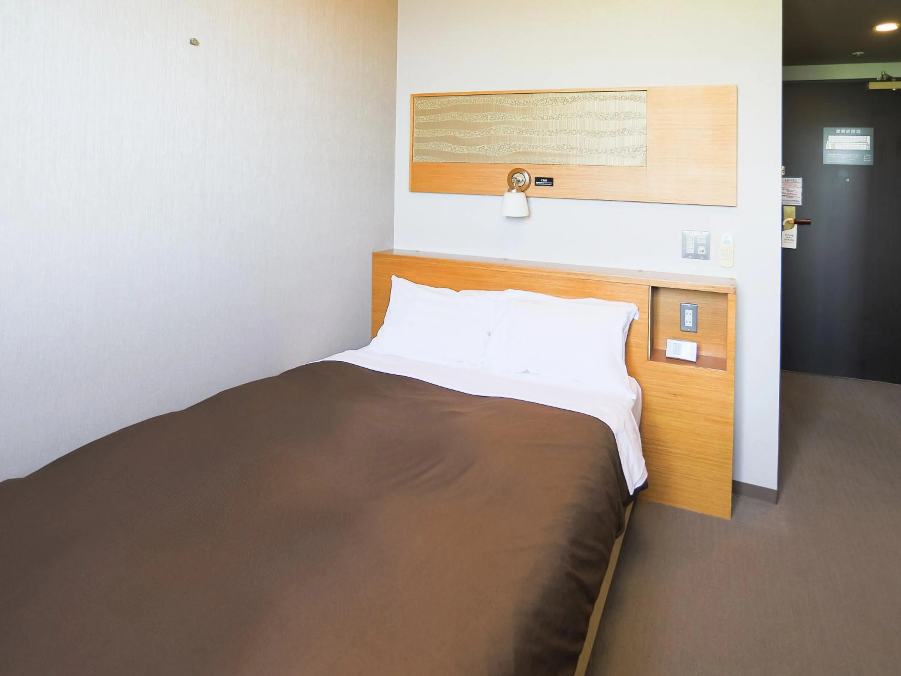 Bed in Castle Inn Sendai