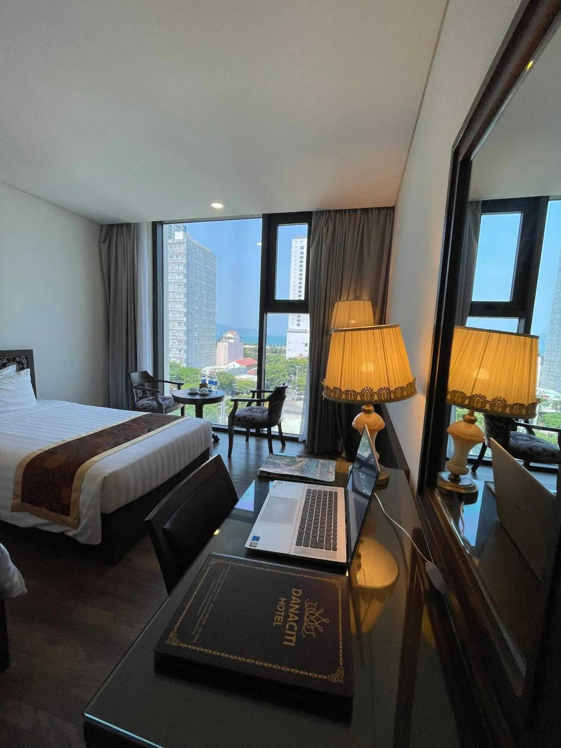 Seating area, Bed in Danaciti Hotel