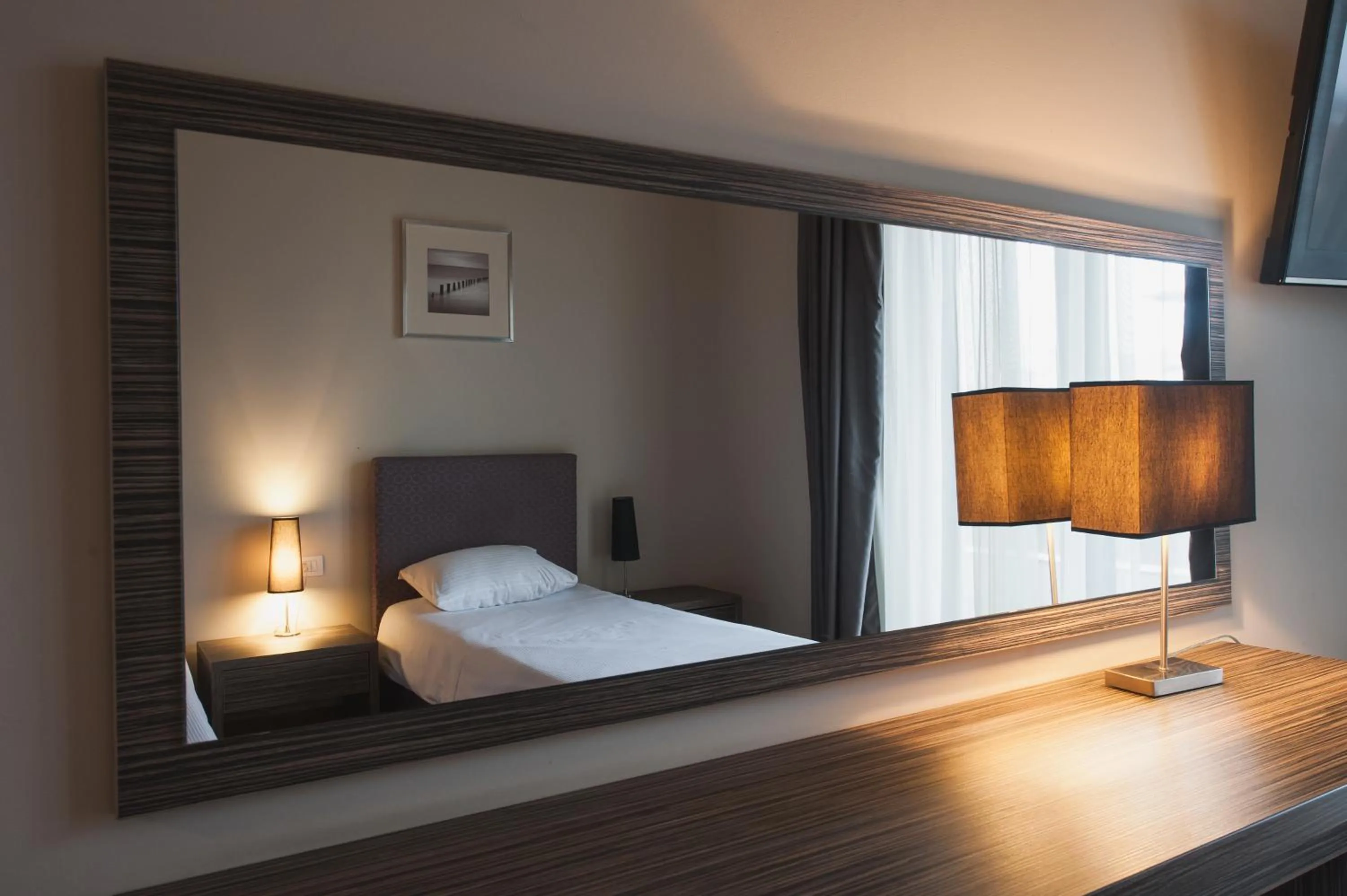 Bed in Hotel Hemingway Residence