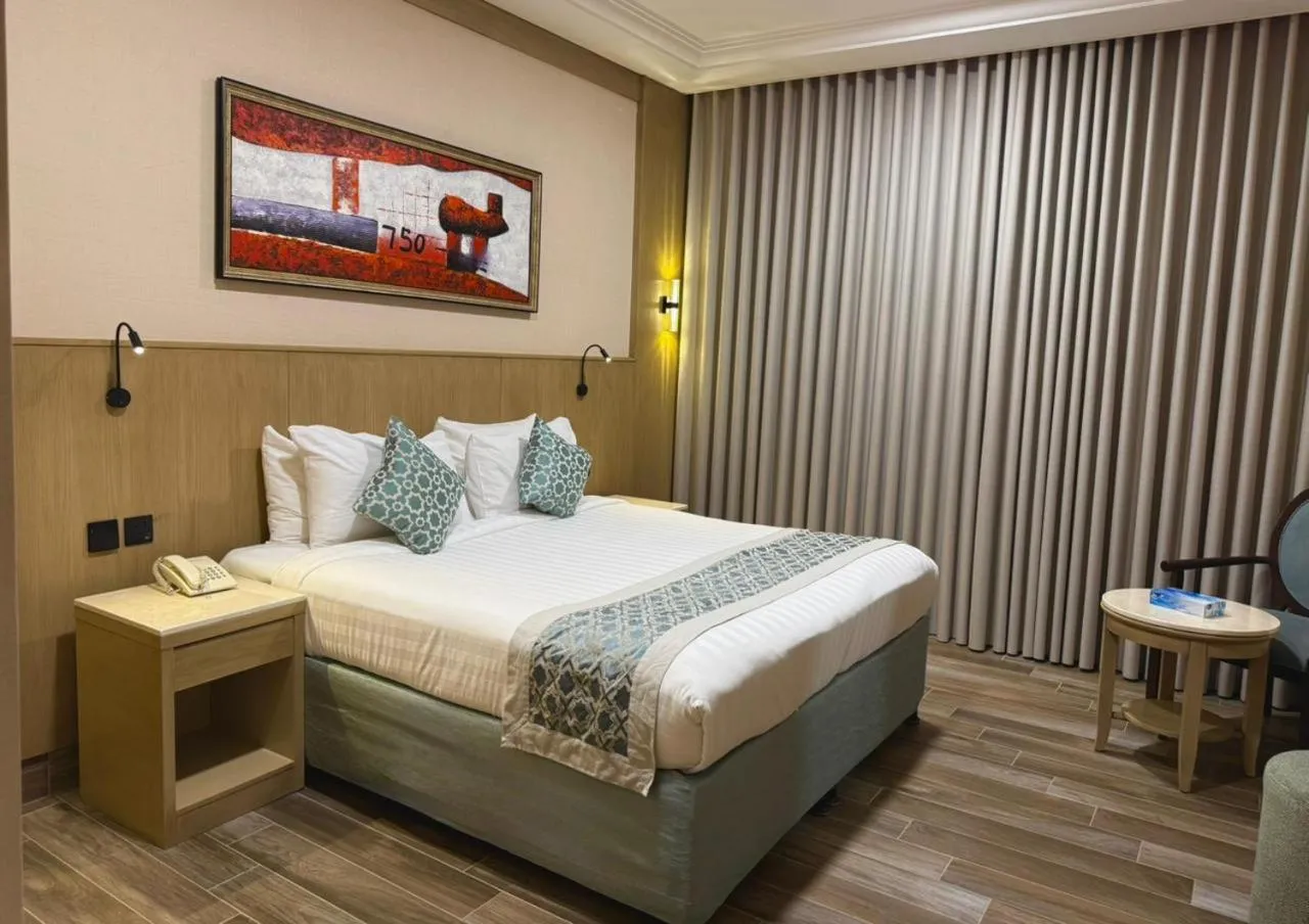 Bed in Afraa Hotel