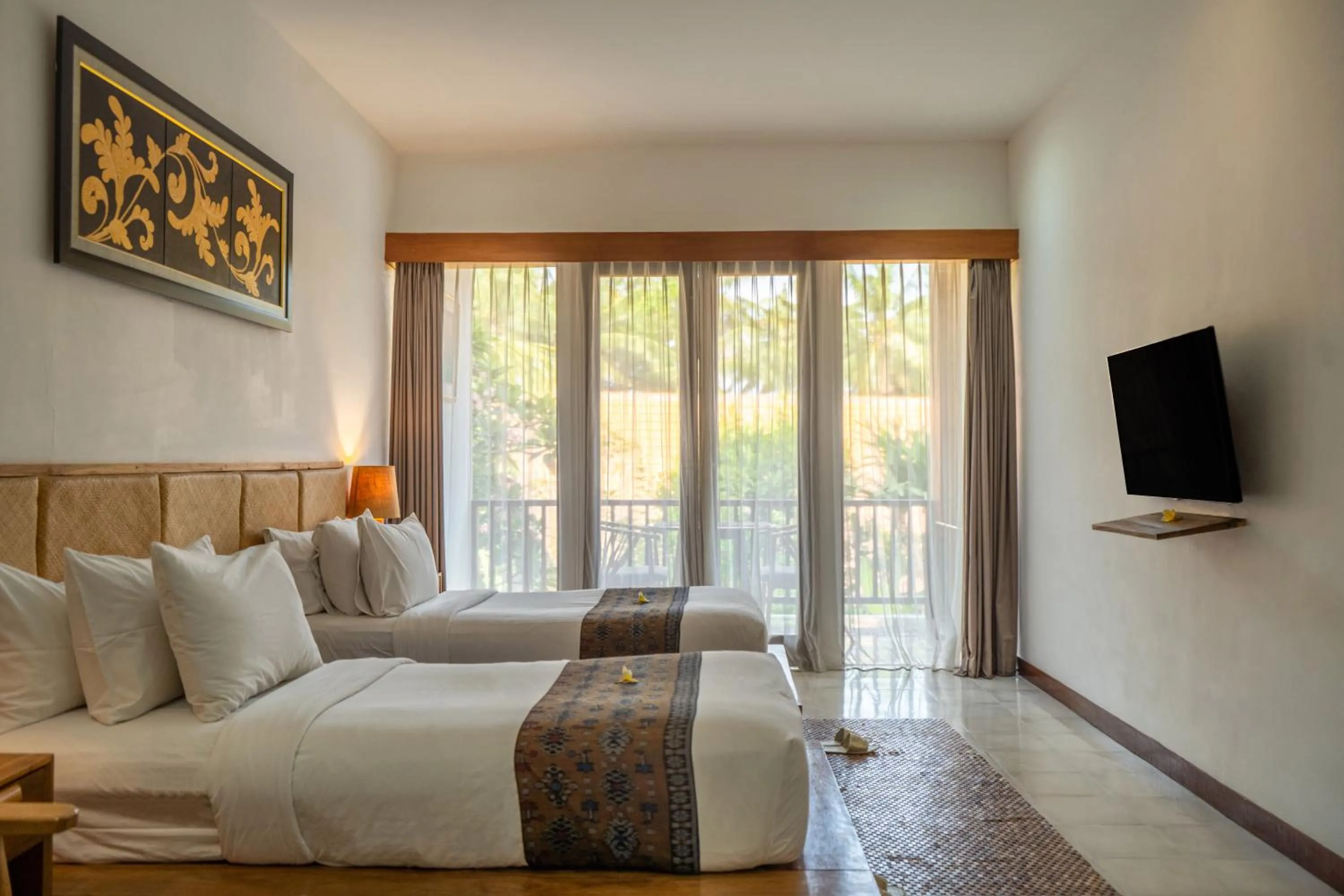 Bed in Purana Boutique Resort