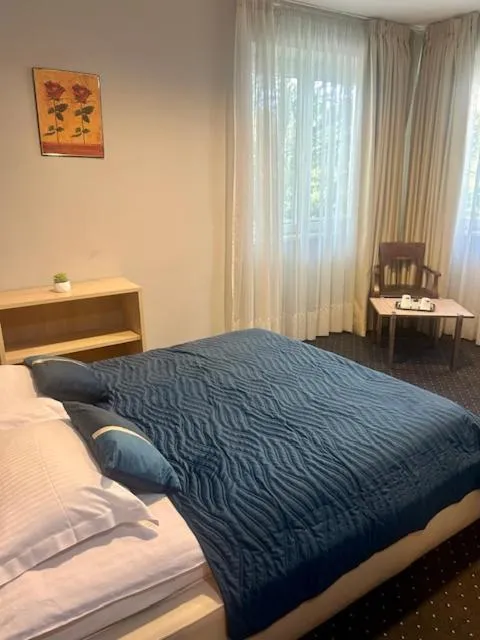 Bed in Hotel Pacific