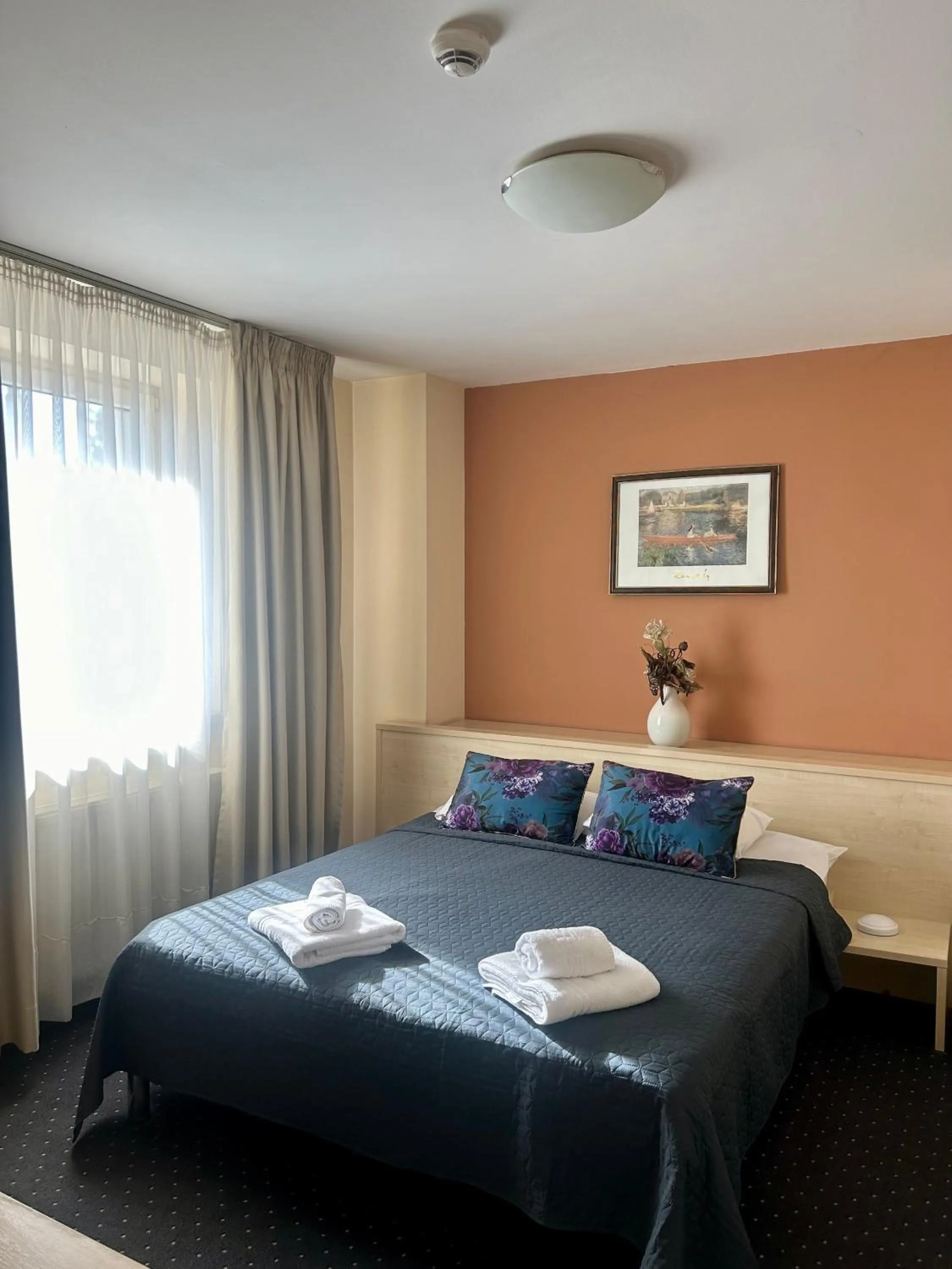 Bed in Hotel Pacific