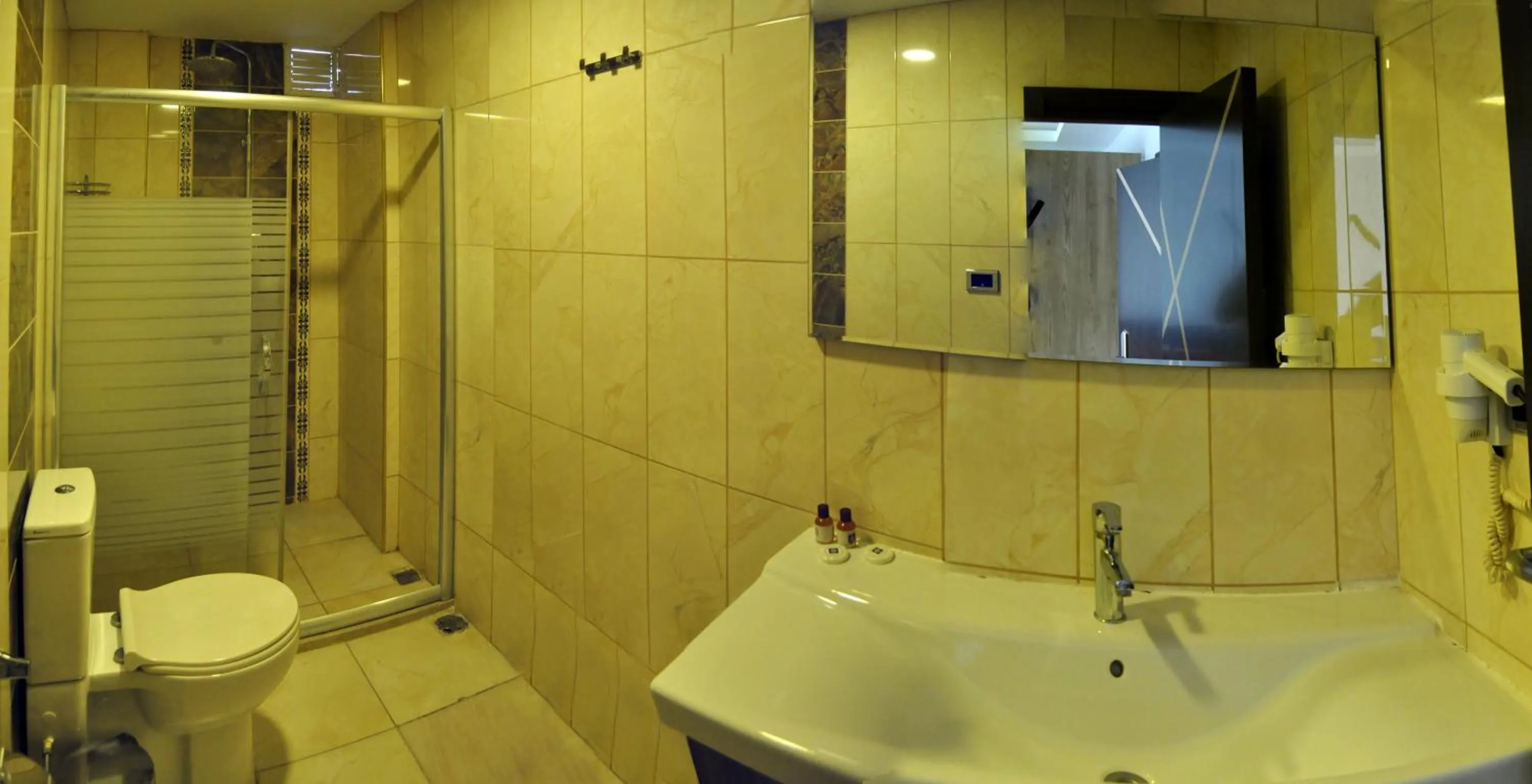 Shower in Waha Hotel