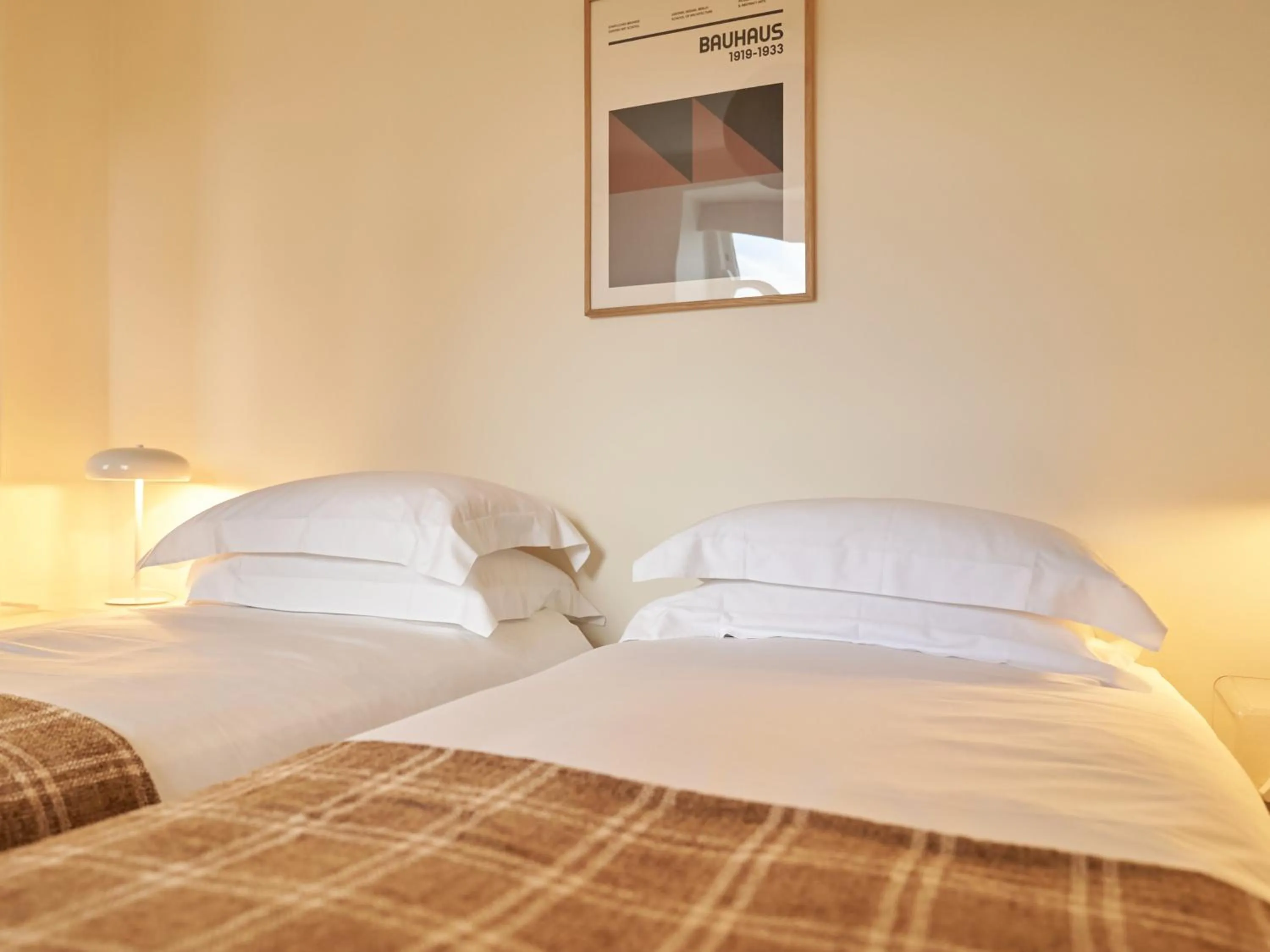 Bed in Europa House Apartments