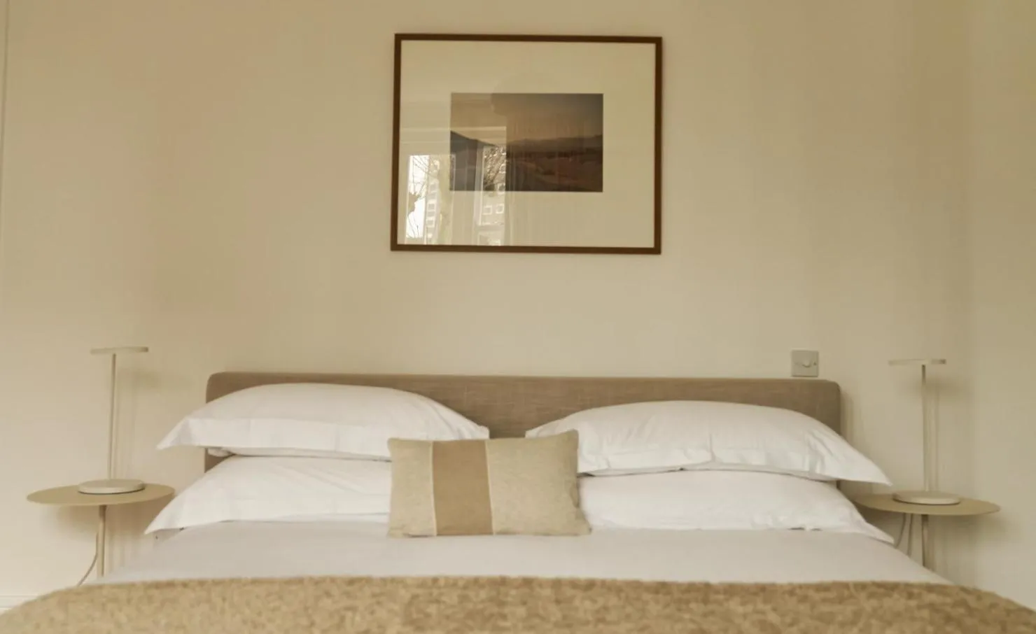 Bed in Europa House Apartments