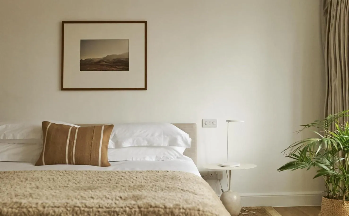 Bed in Europa House Apartments