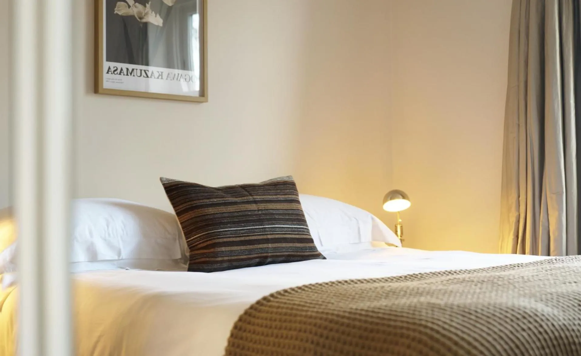 Bed in Europa House Apartments