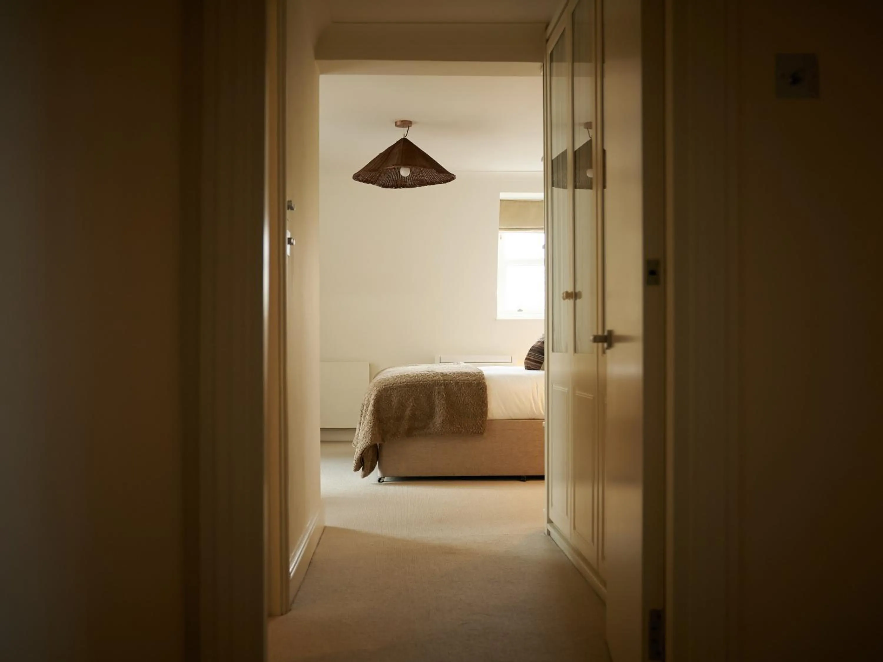 Bed in Europa House Apartments