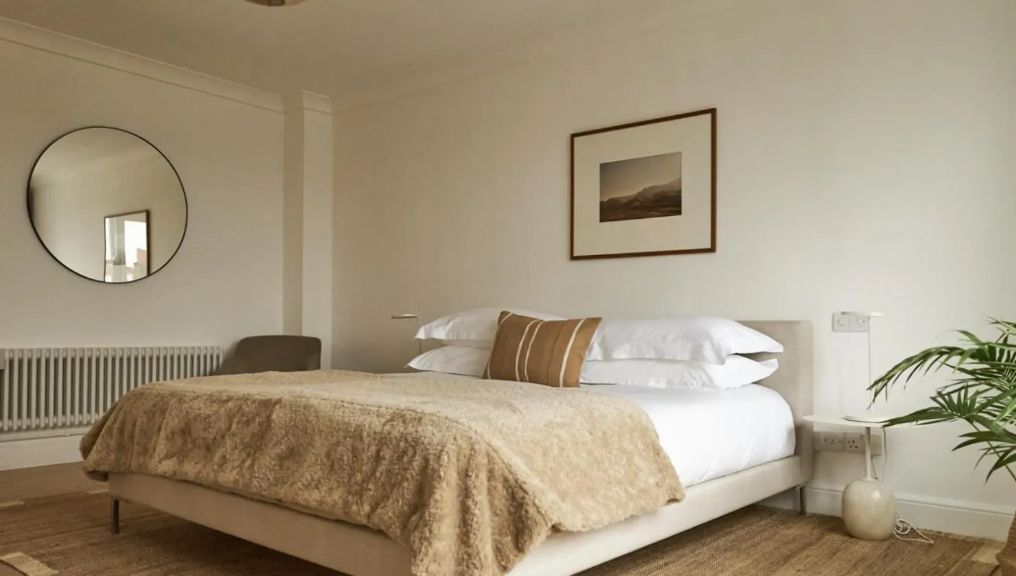 Bed in Europa House Apartments