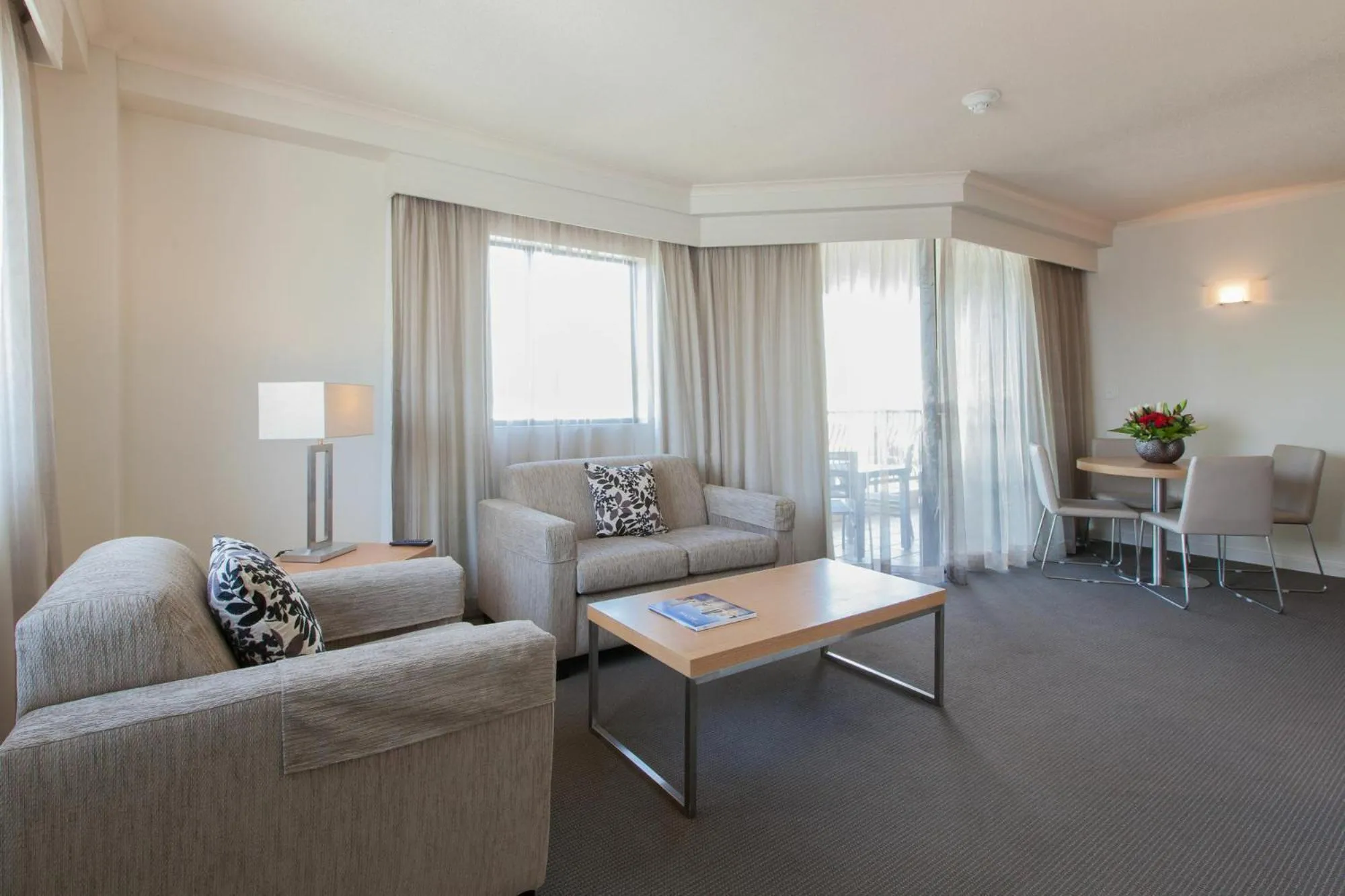 Living room in Cosmo Apartment Hotel