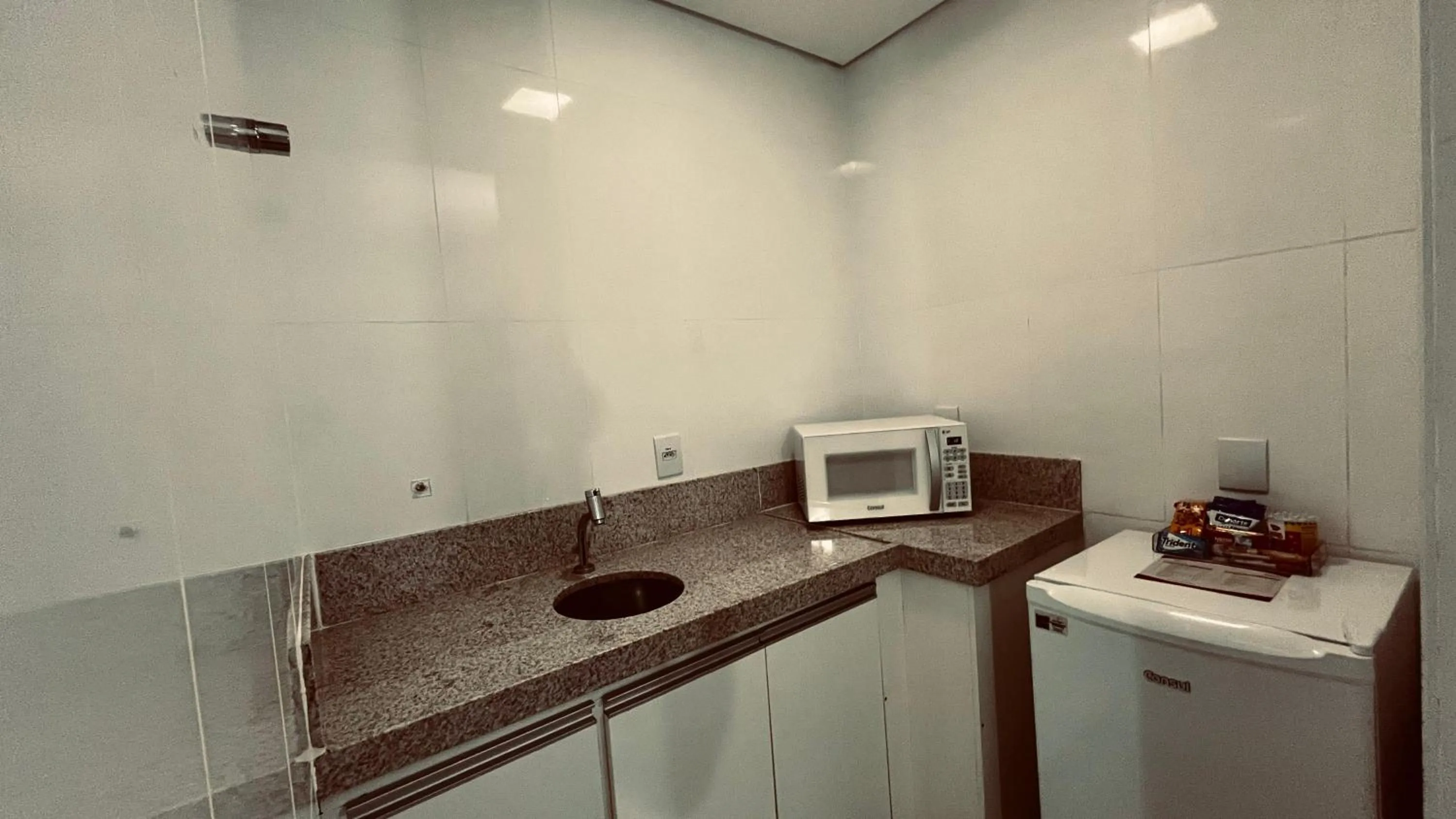 kitchen in Hotel Amsterdam Montes Claros