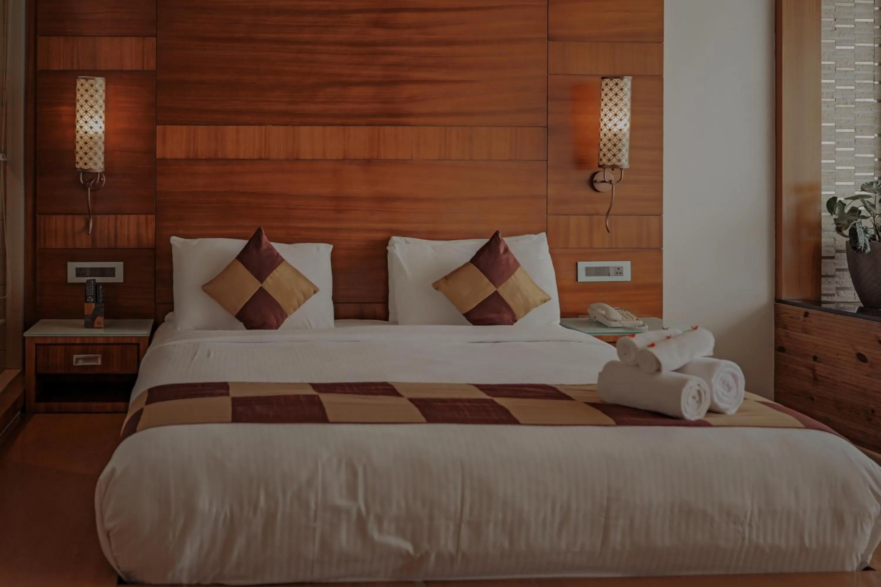 Bed in Amber Dale Luxury Hotel & Spa, Munnar