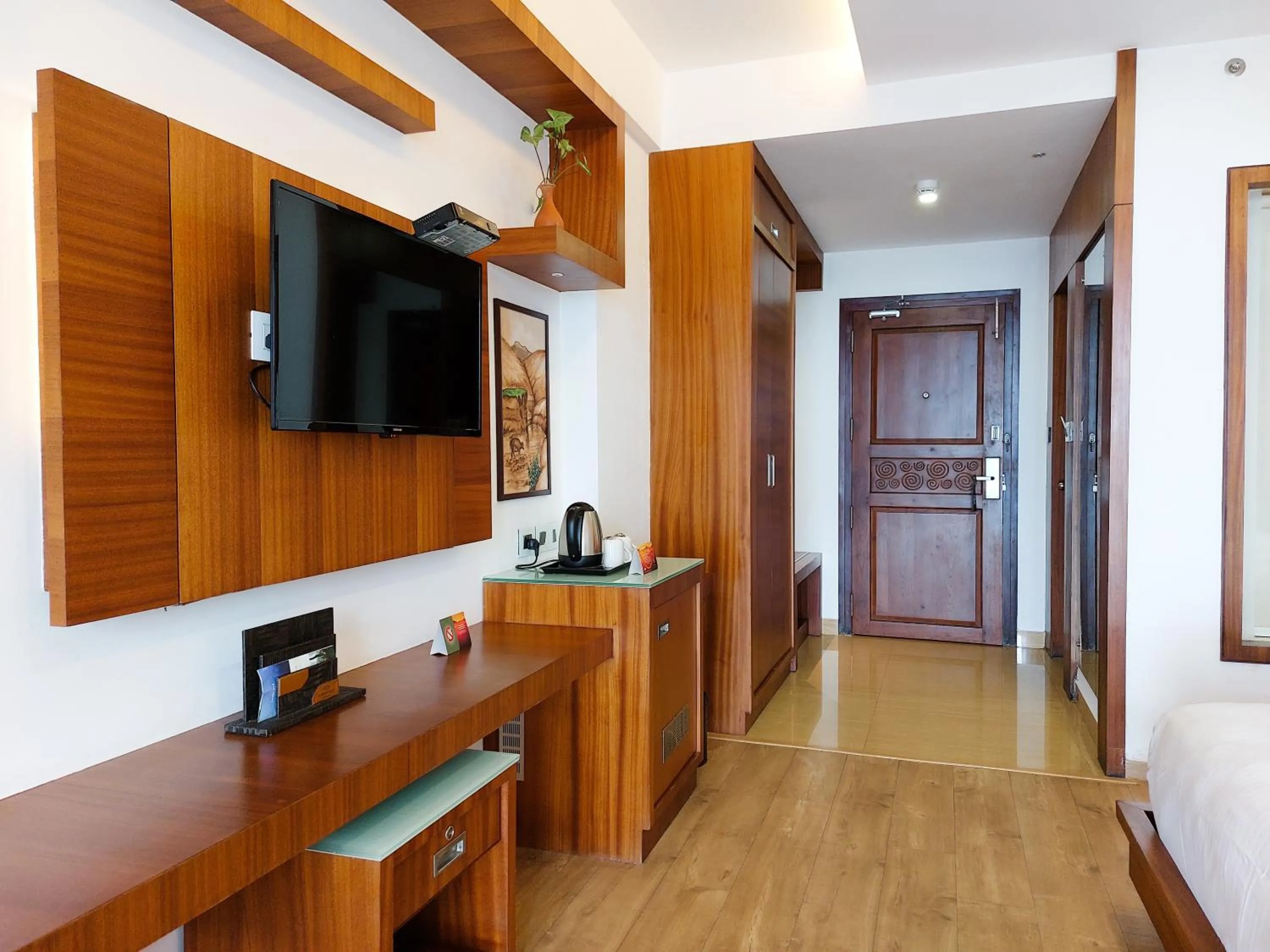 TV and multimedia in Amber Dale Luxury Hotel & Spa, Munnar