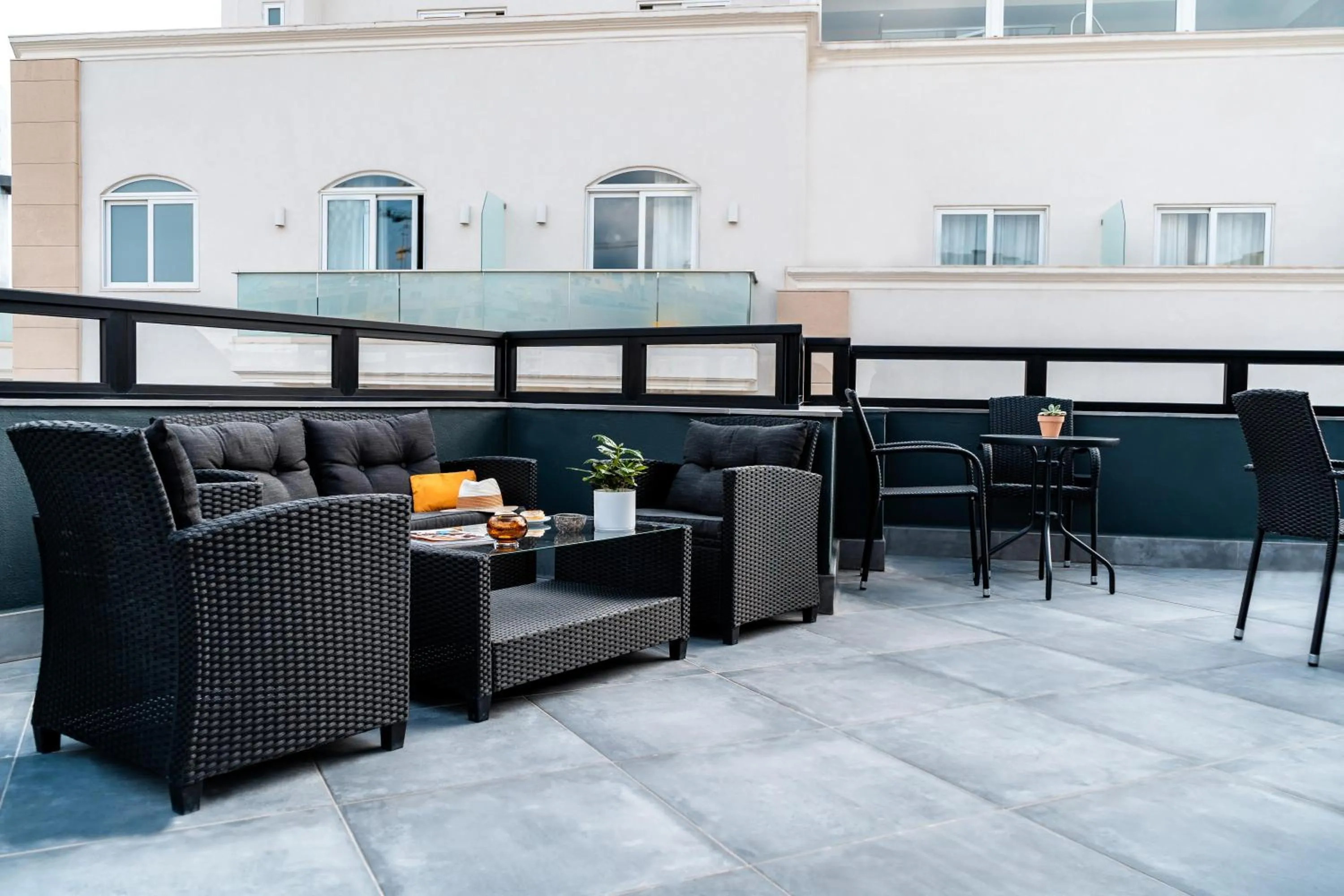 Balcony/Terrace in Urban Rooms by NEU Collective