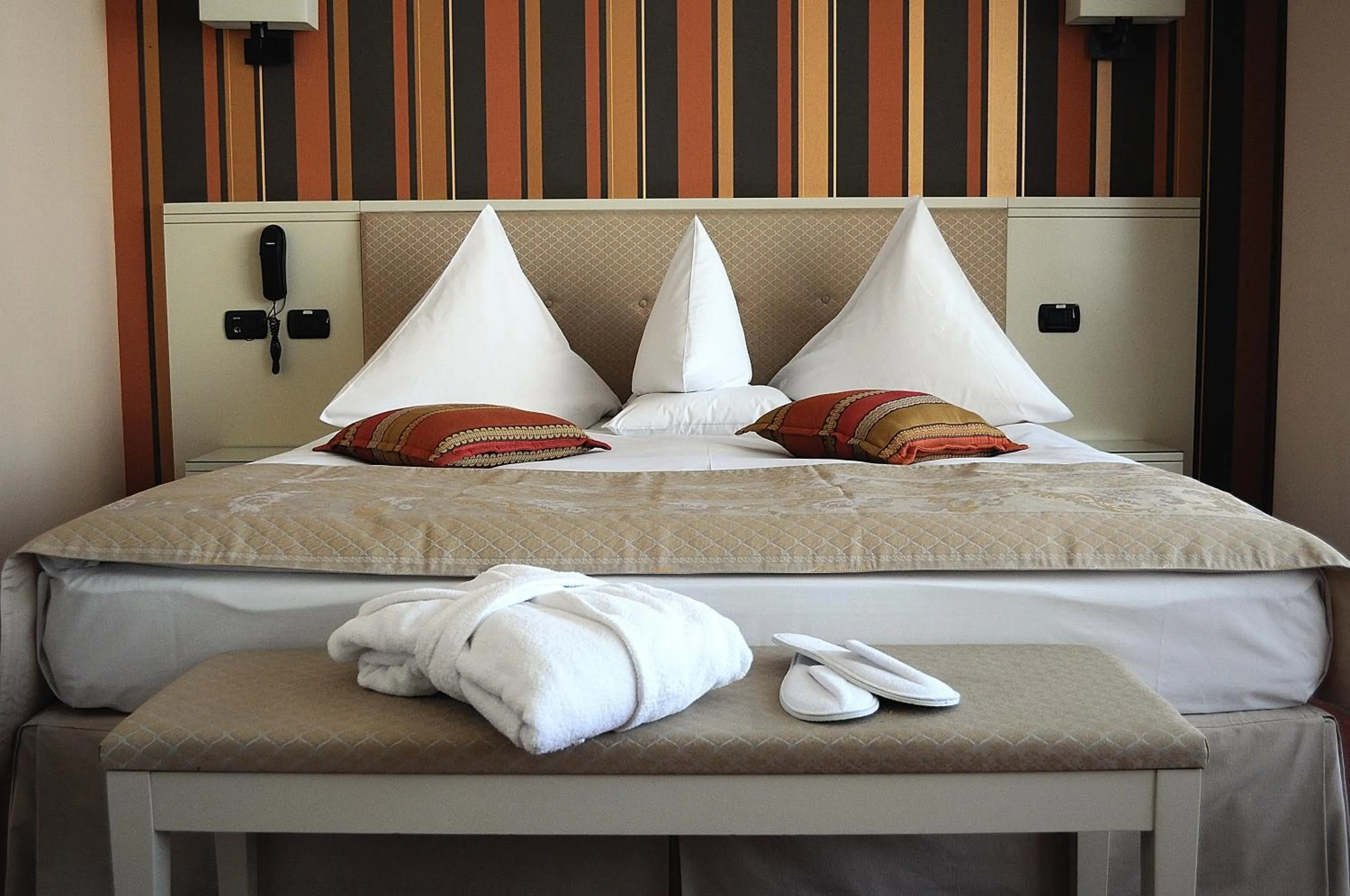 Bed in Hotel Paradis