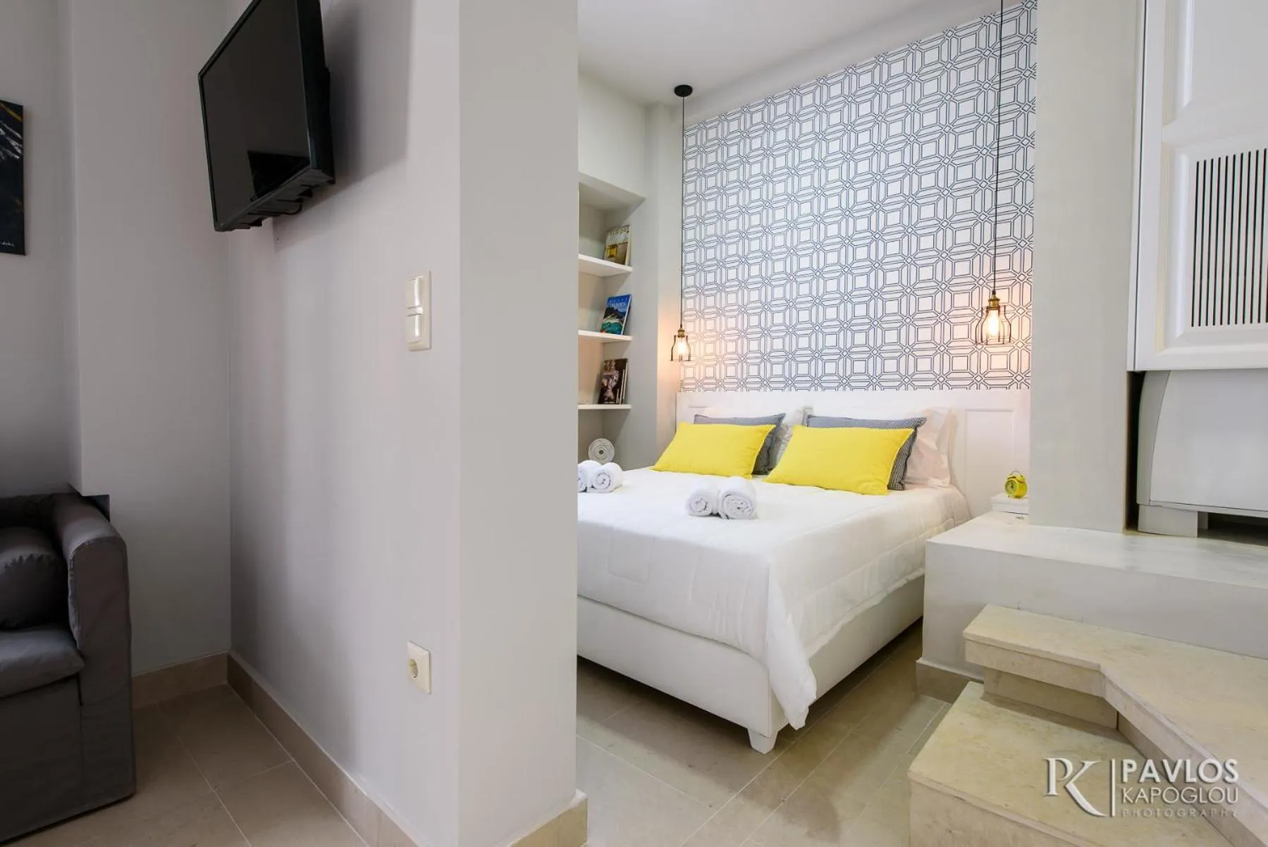 Bed in Candia Suites & Rooms