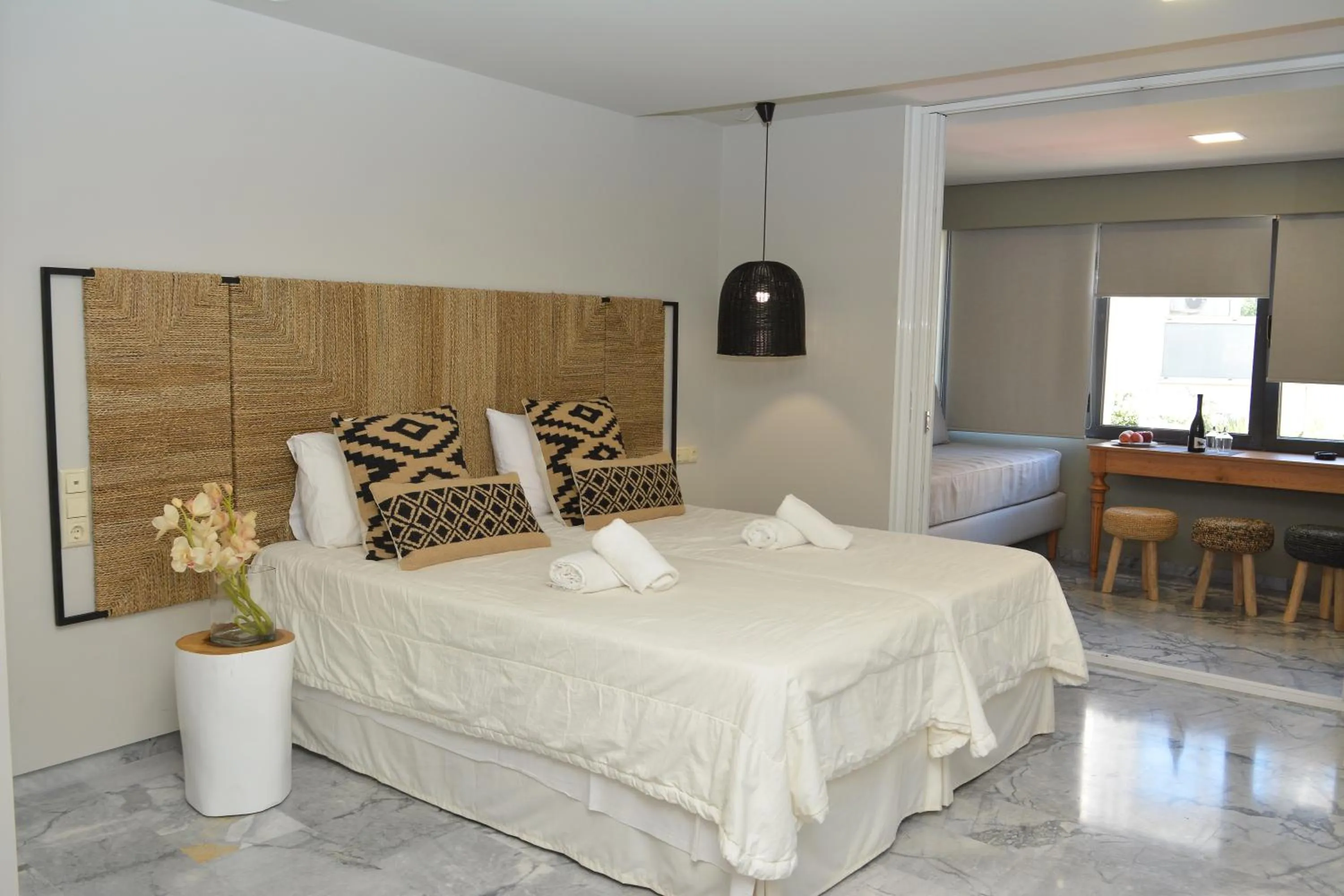 Bed in Candia Suites & Rooms