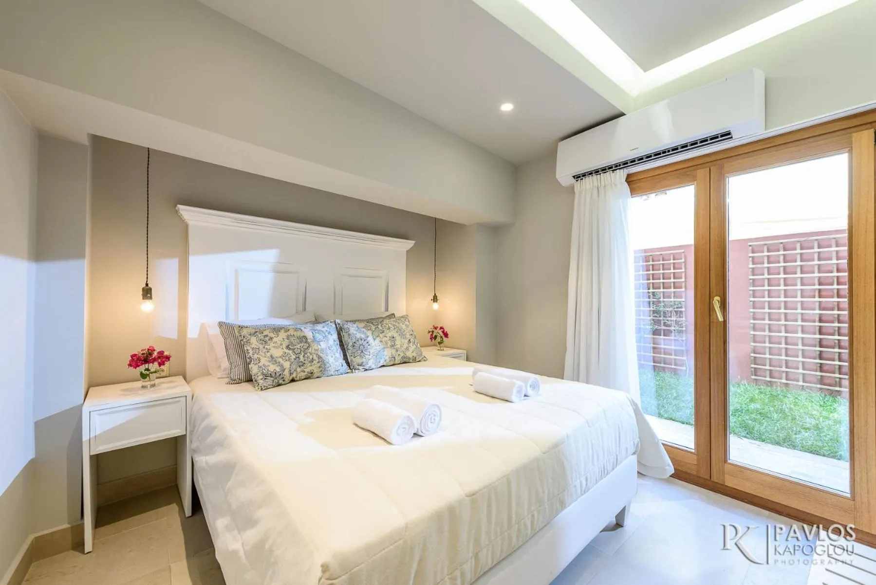 Bed in Candia Suites & Rooms