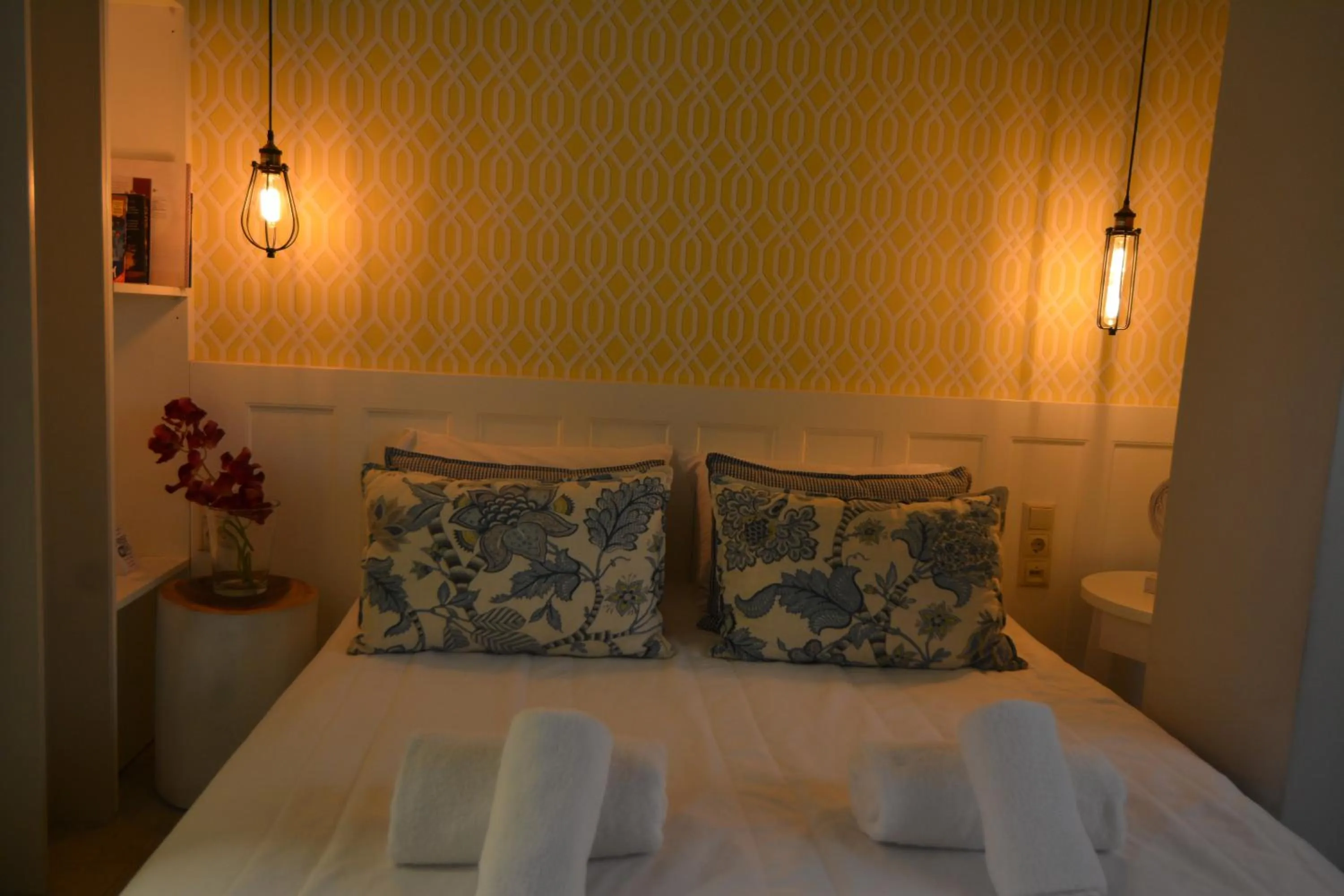 Bed in Candia Suites & Rooms