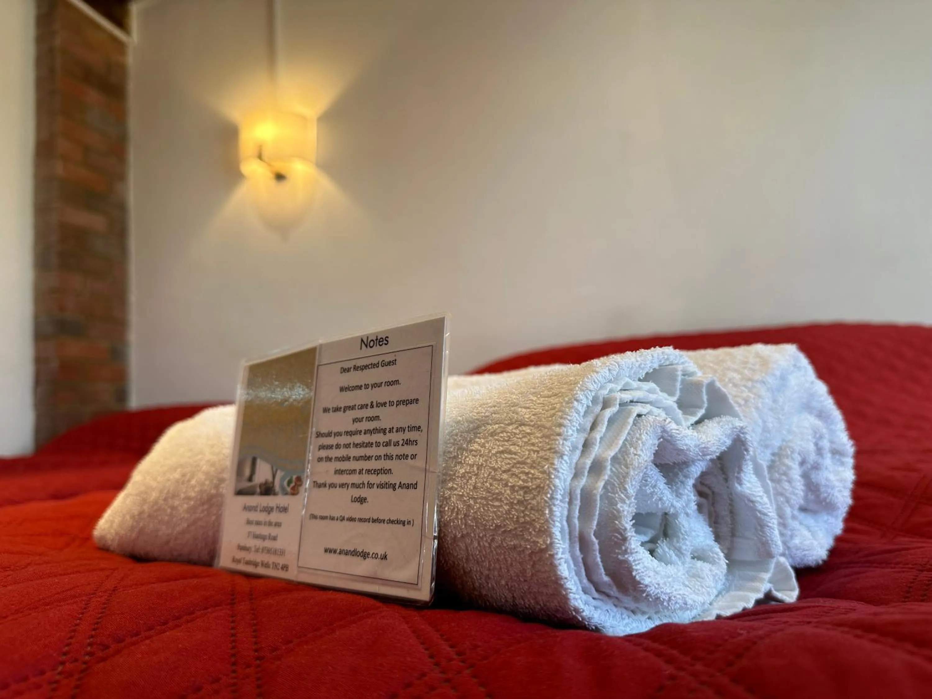 towels, Bed in Anand Lodge