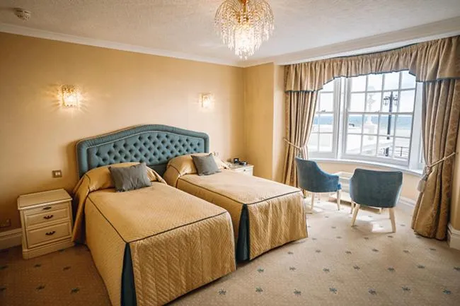 Bed in Hotel Riviera