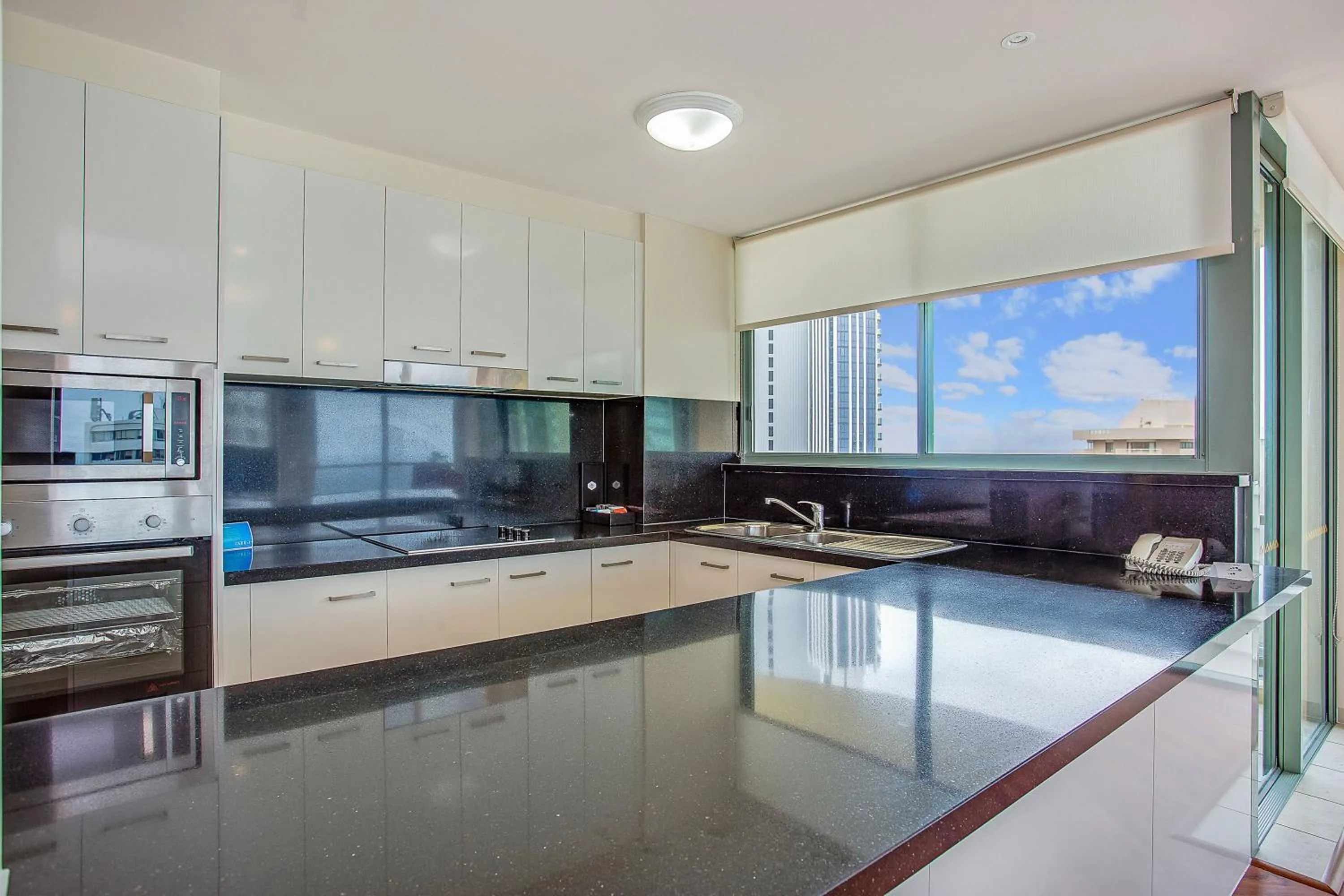 Kitchen or kitchenette in Mantra Sun City