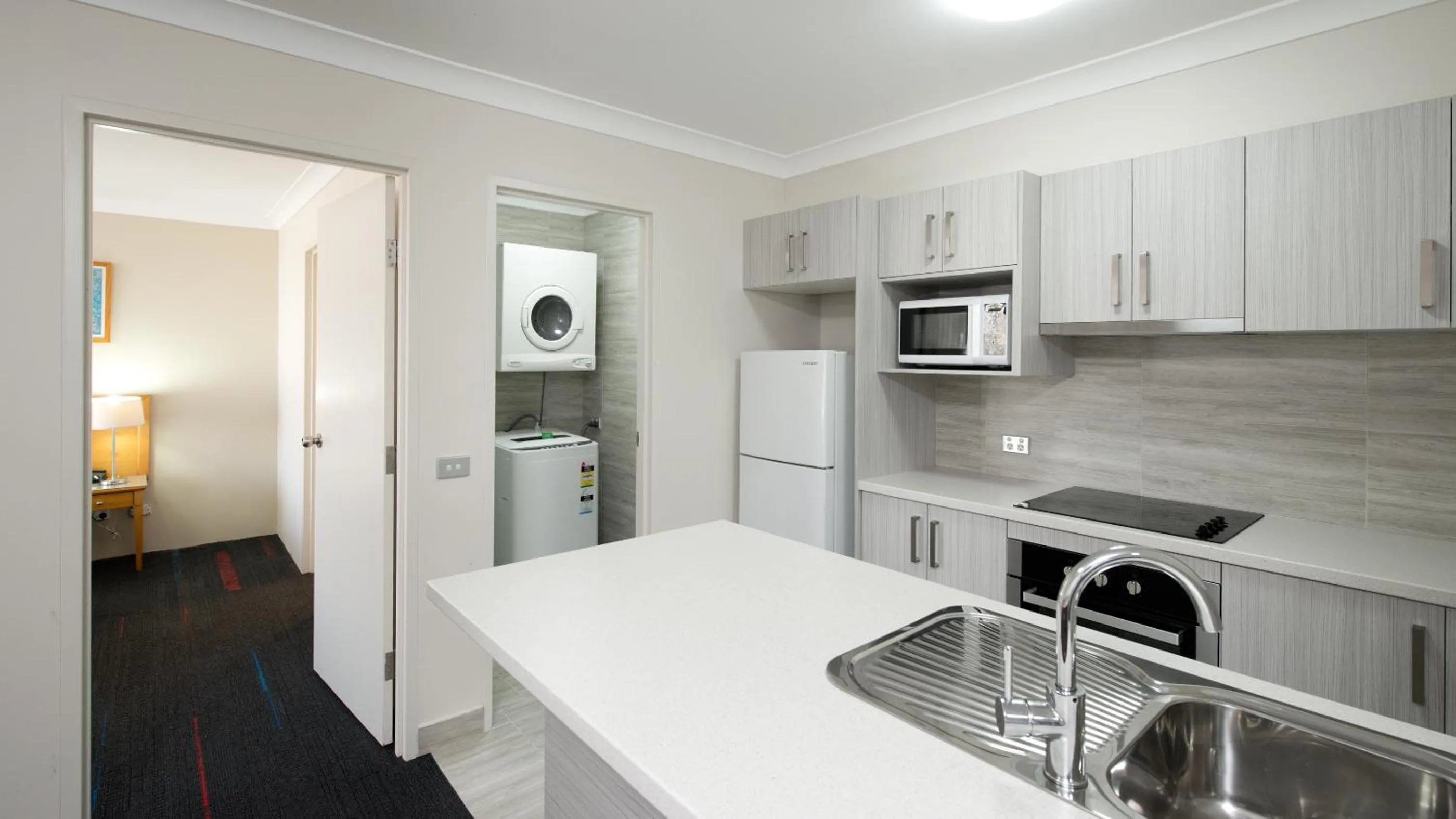 Kitchen or kitchenette in APX Parramatta