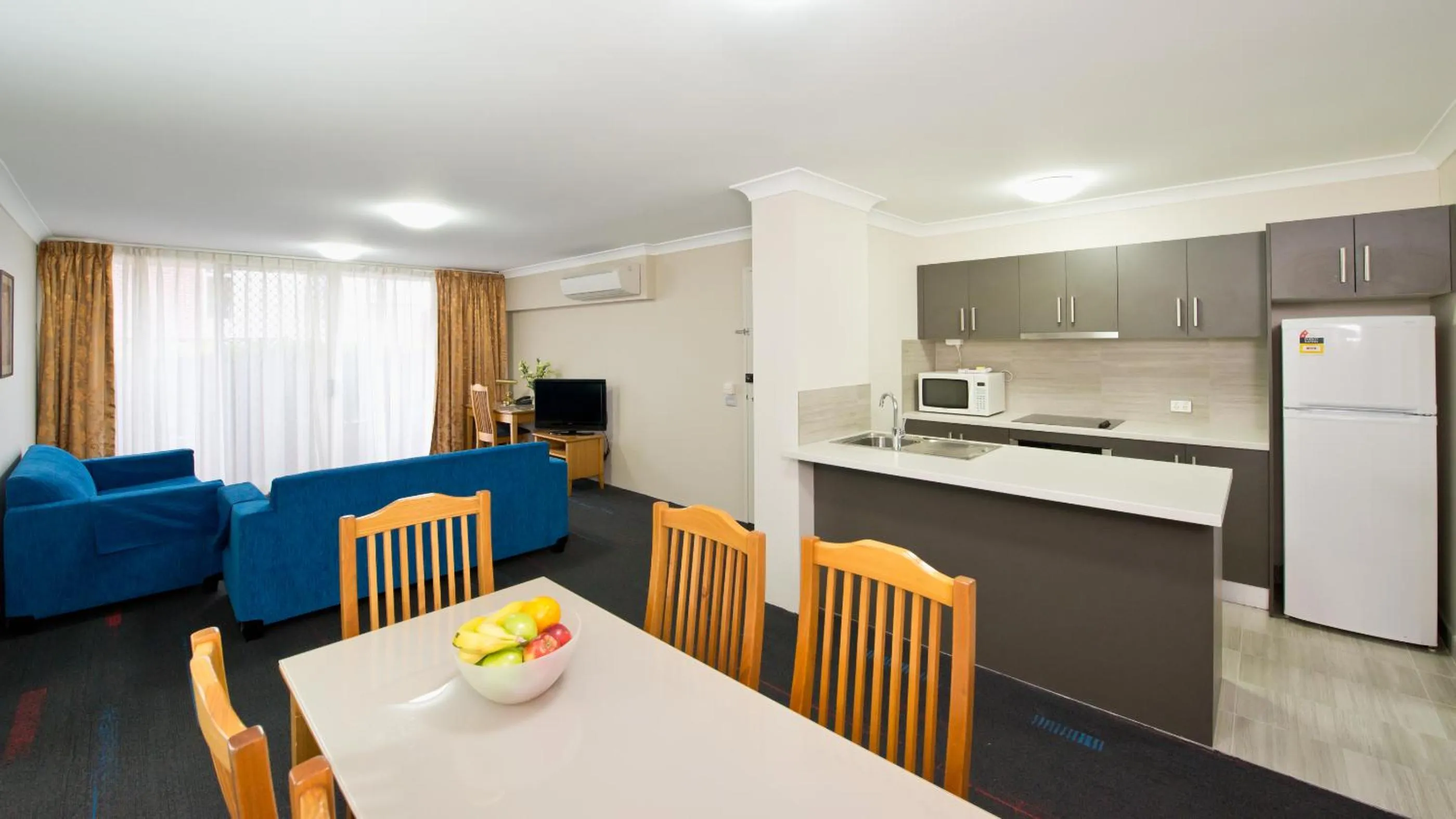 Kitchen or kitchenette in APX Parramatta