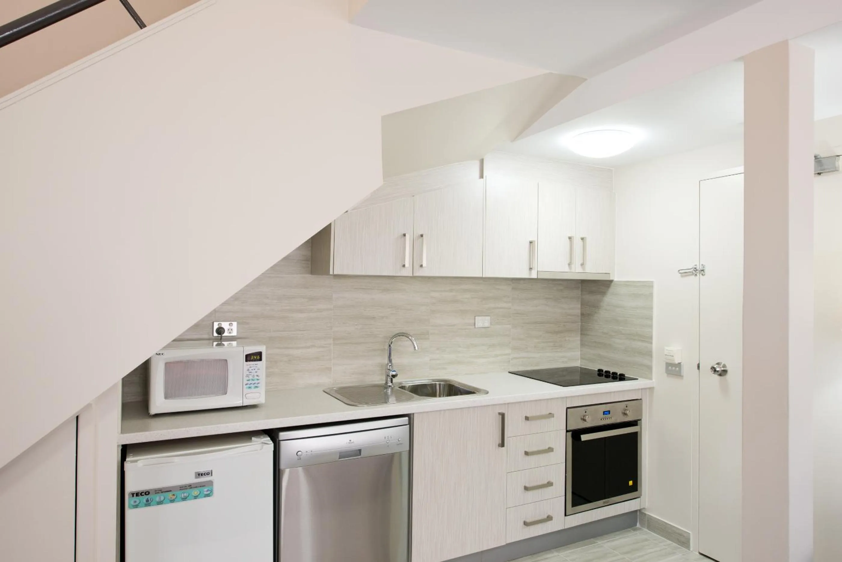 Kitchen or kitchenette in APX Parramatta