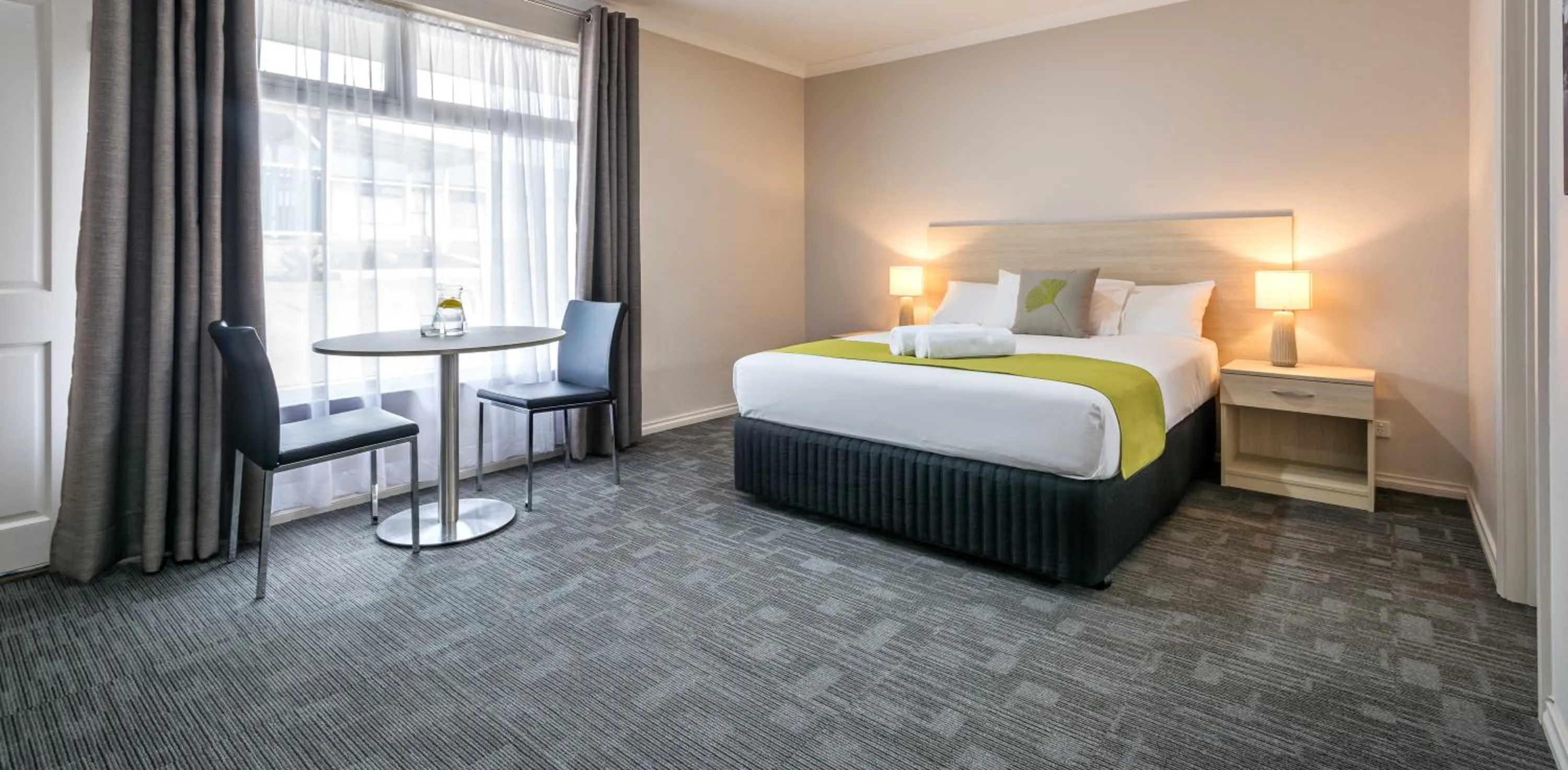 Seating area, Bed in Mandala Ace Albany Hotel