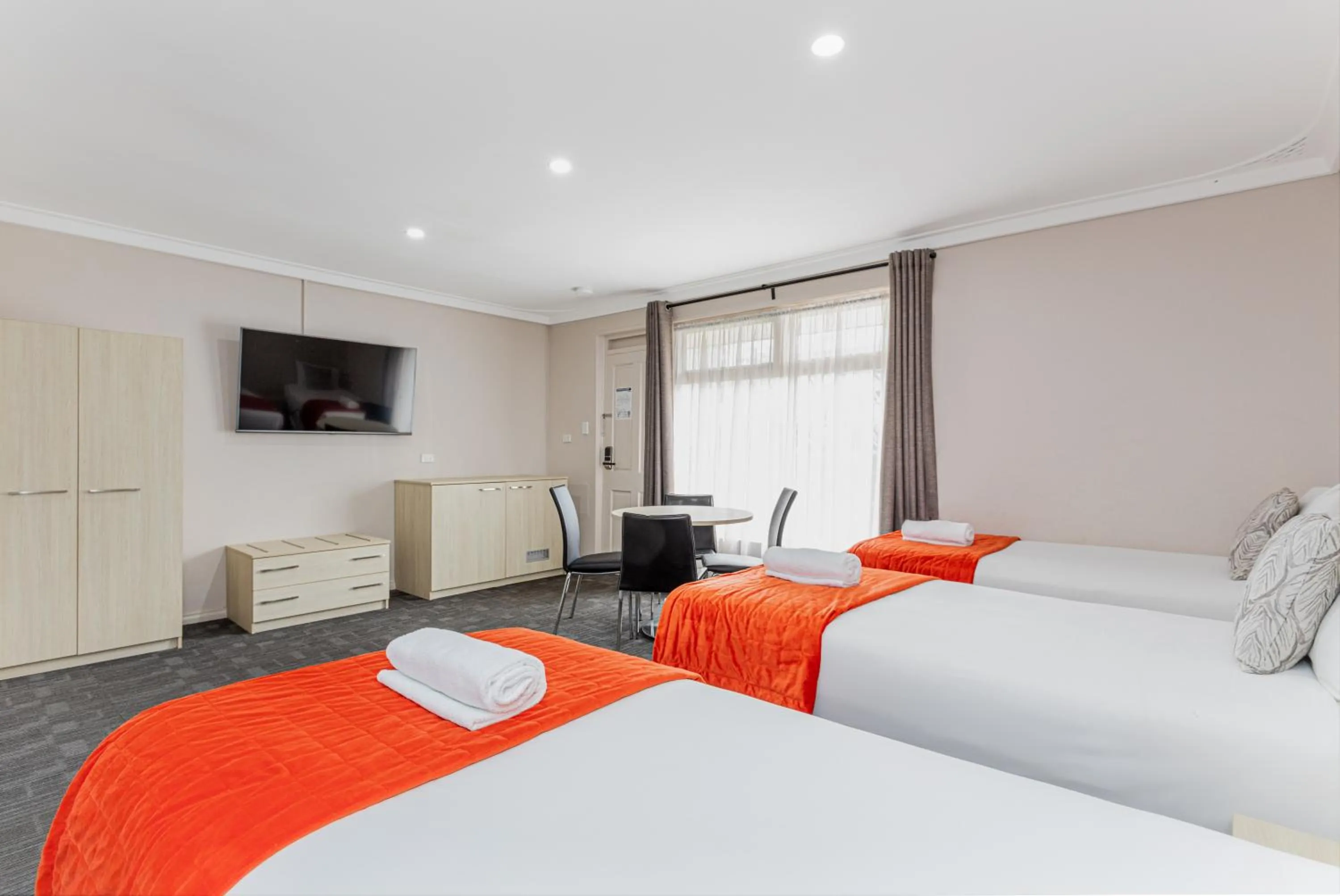 Seating area, Bed in Mandala Ace Albany Hotel