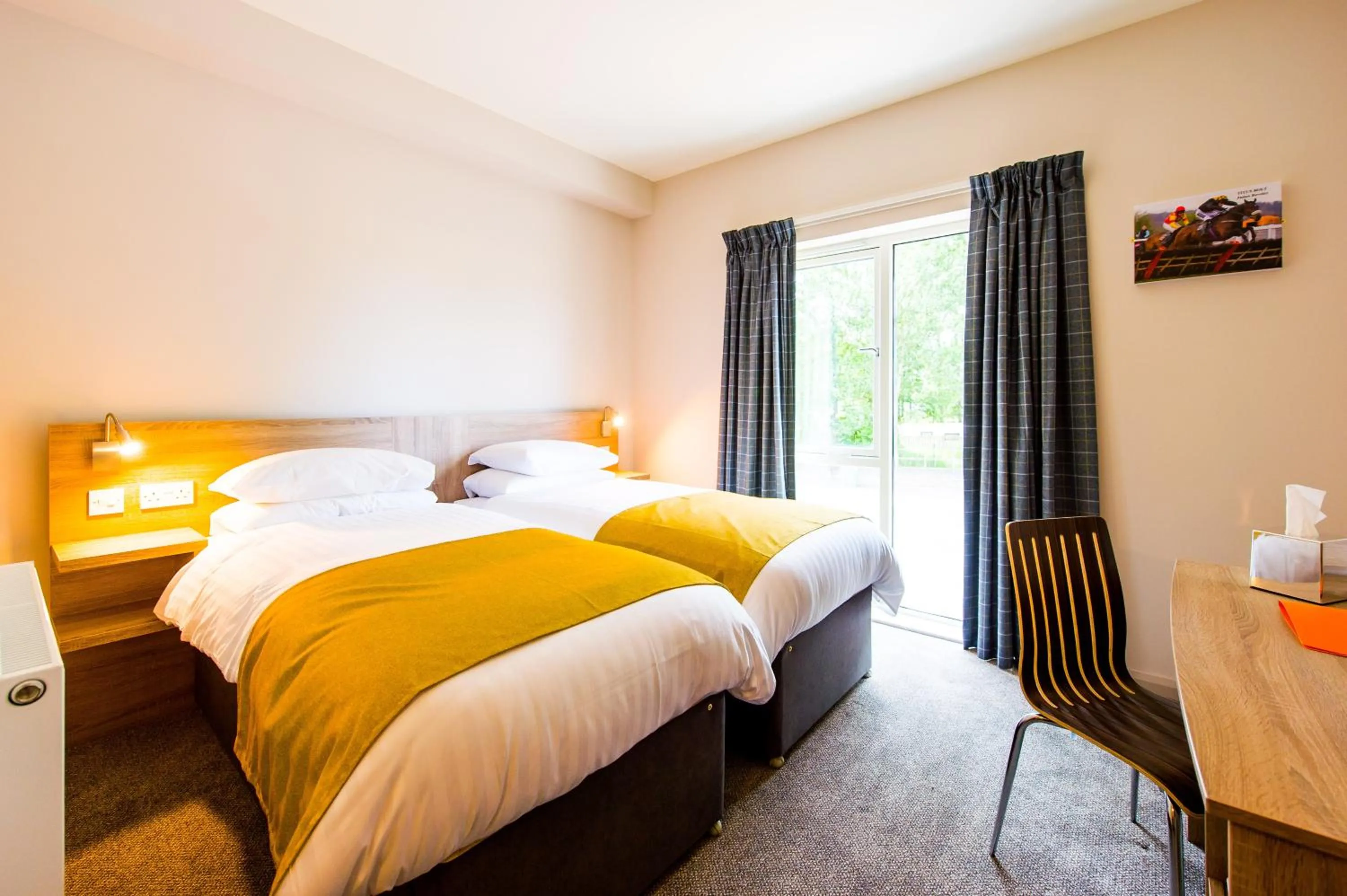 Photo of the whole room, Bed in The Lodge At Perth Racecourse