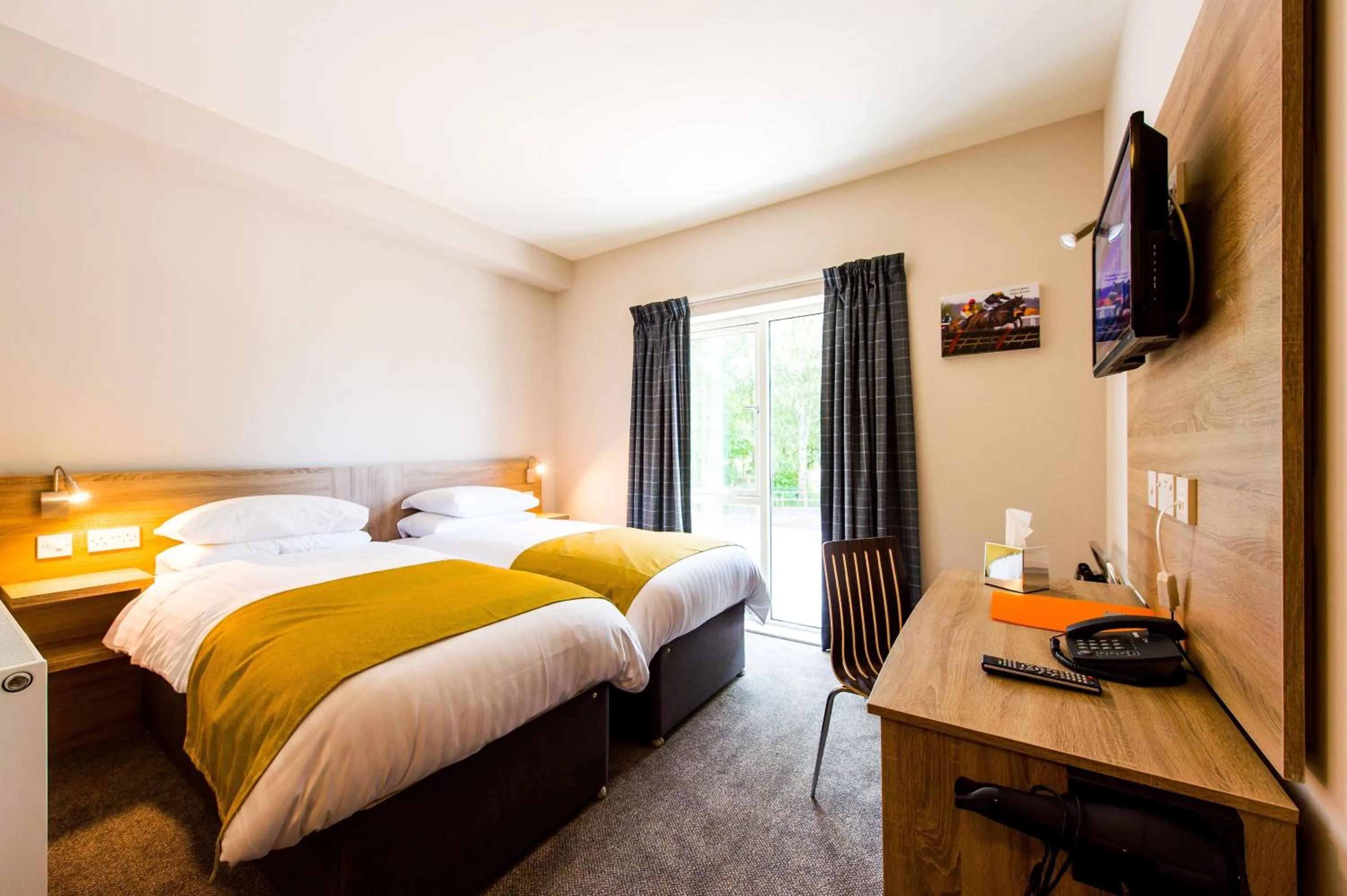 Photo of the whole room, Bed in The Lodge At Perth Racecourse