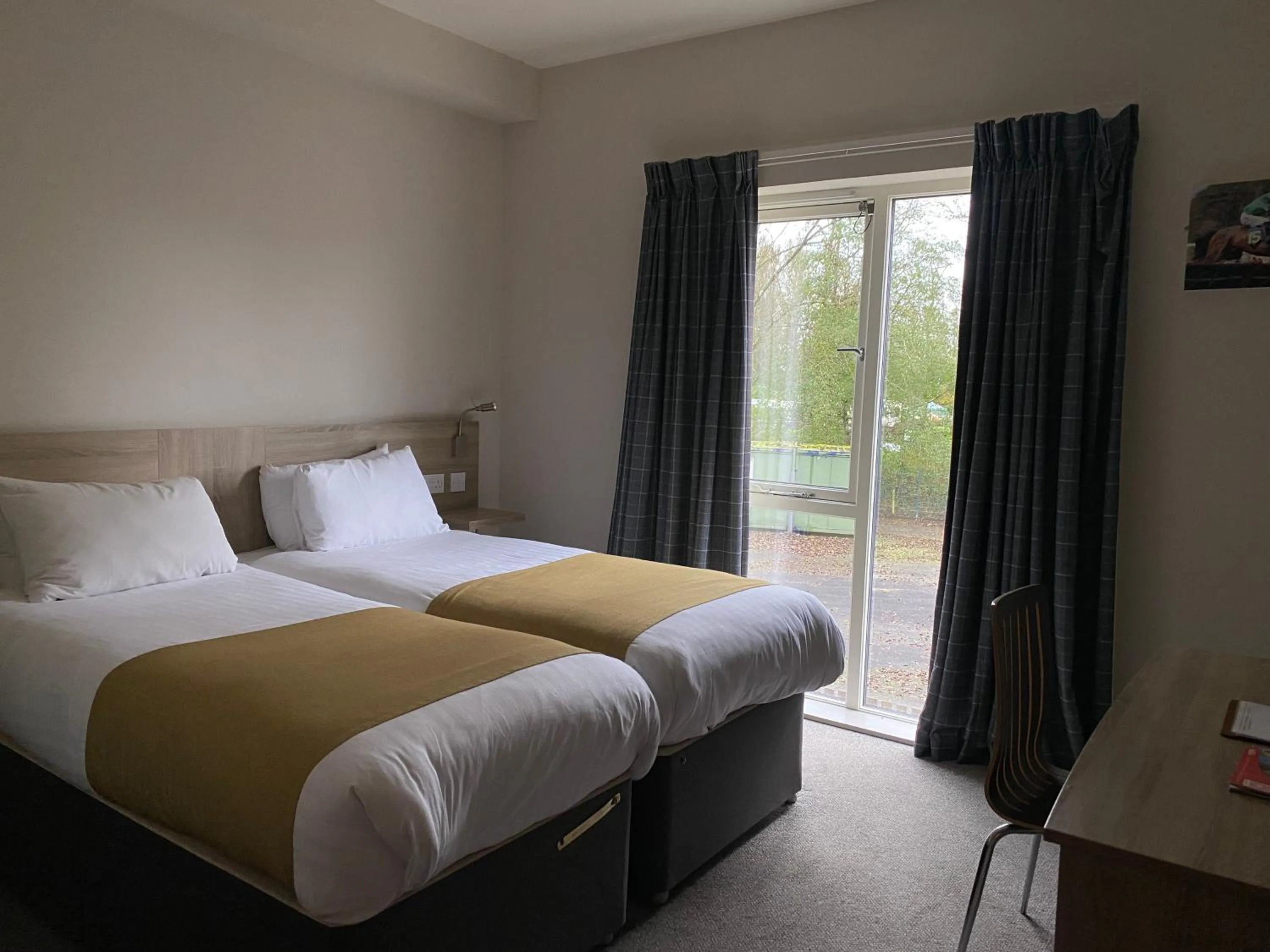 Photo of the whole room, Bed in The Lodge At Perth Racecourse