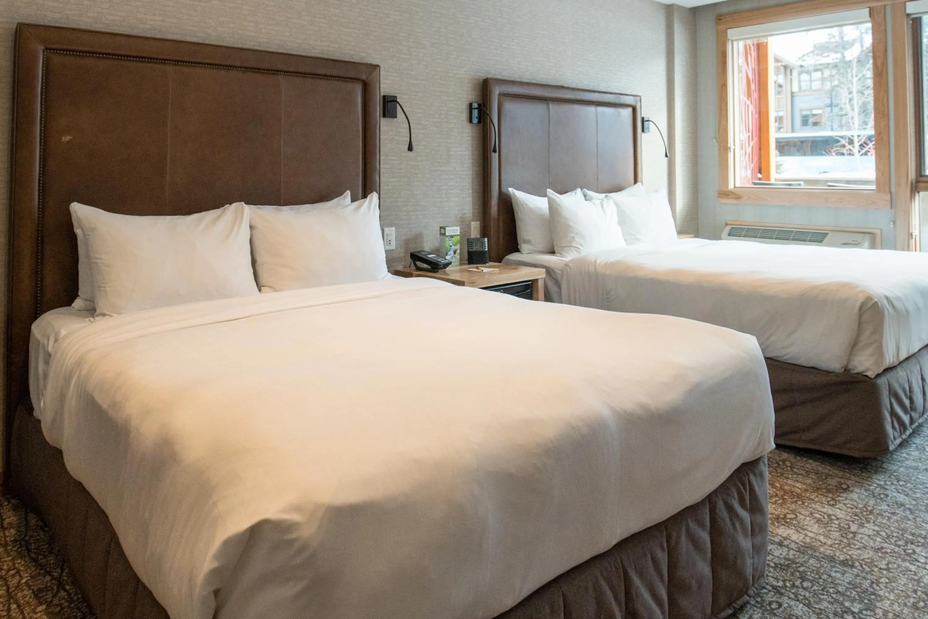 Bed in Moose Hotel and Suites