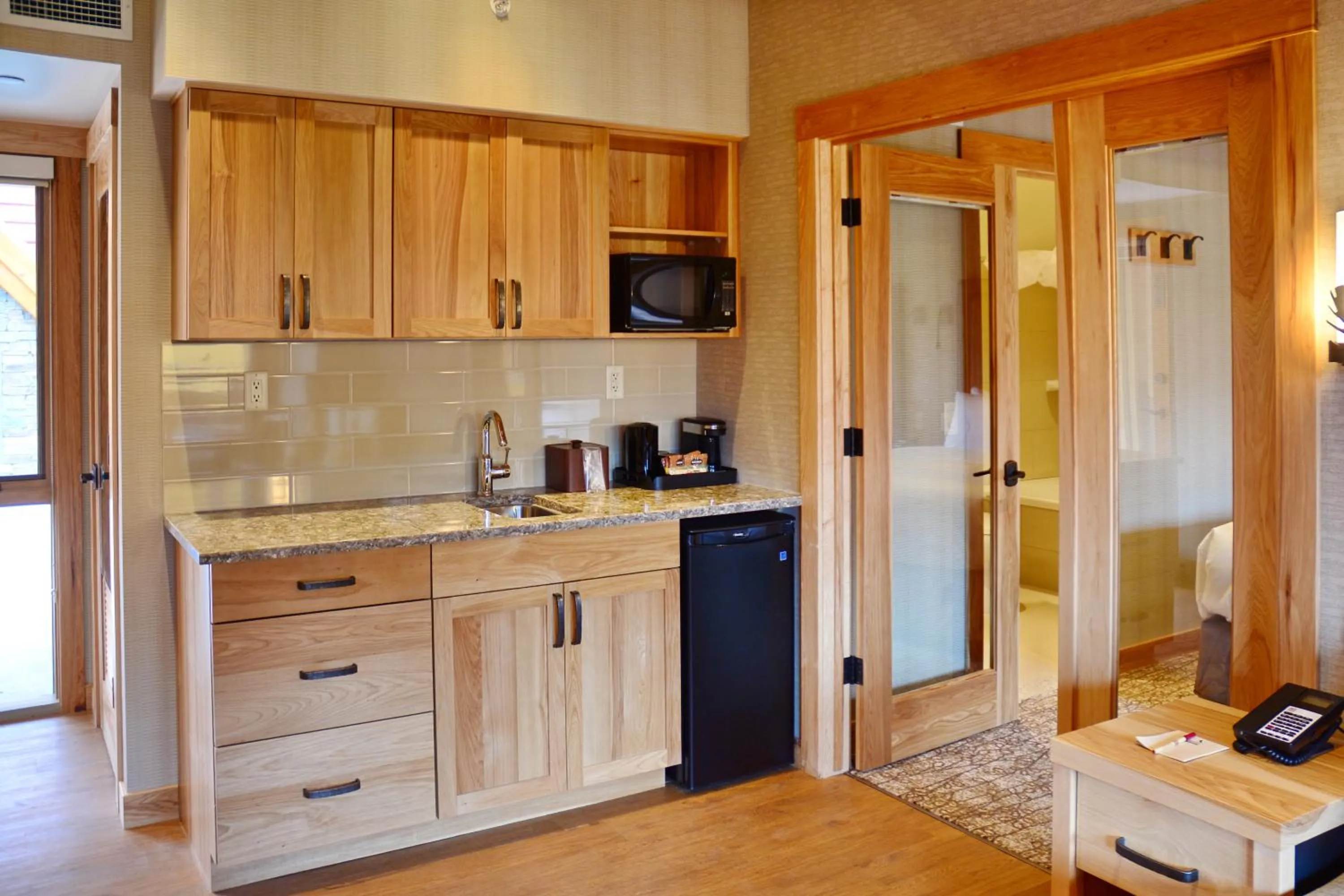 Kitchen or kitchenette in Moose Hotel and Suites