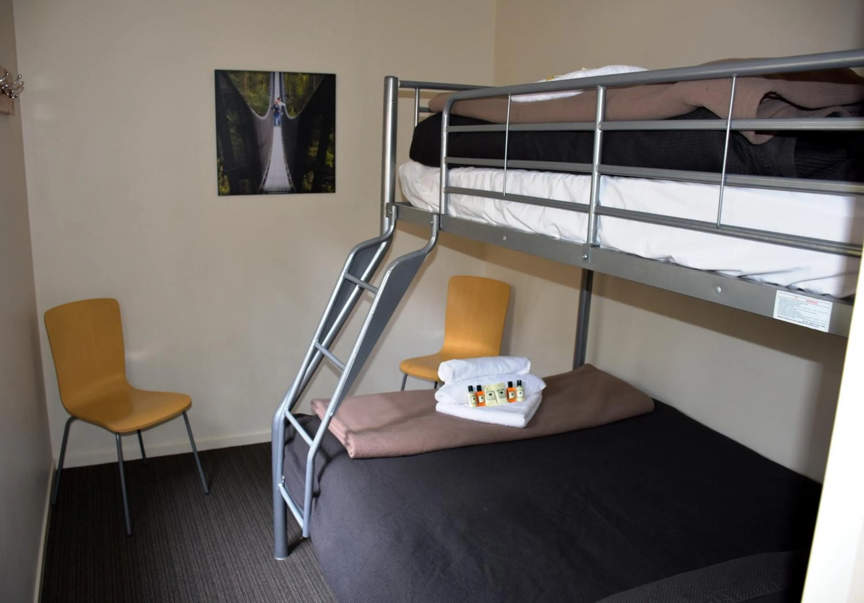 Decorative detail, Bed in Tahune AirWalk Cabin and Lodge