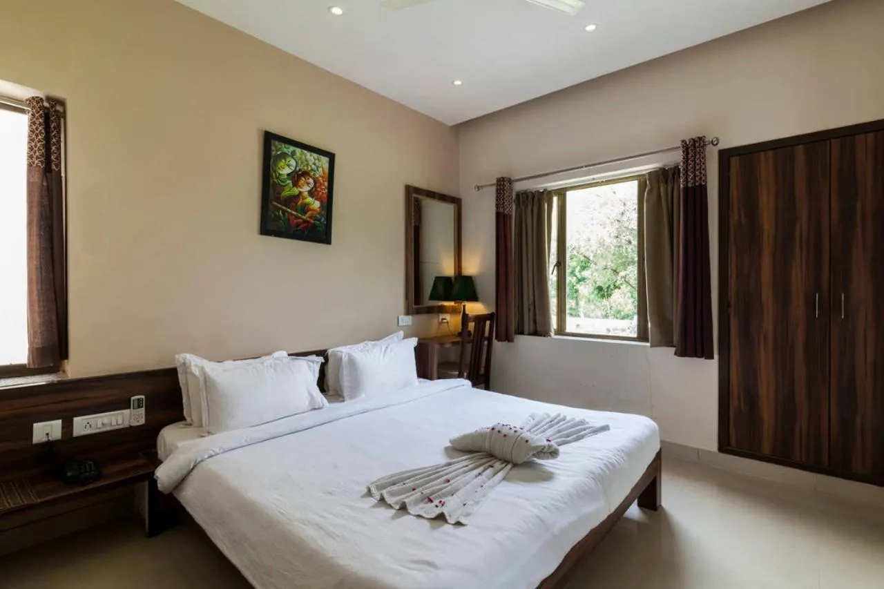 Bedroom, Bed in Riverarch Greenfields Resort